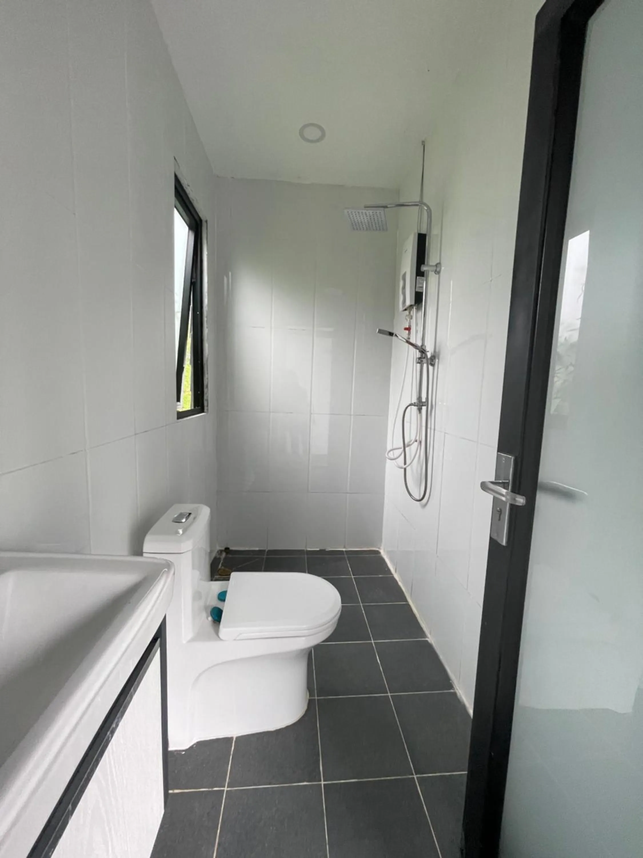 Shower in Kampot River Bungalow by MAMA