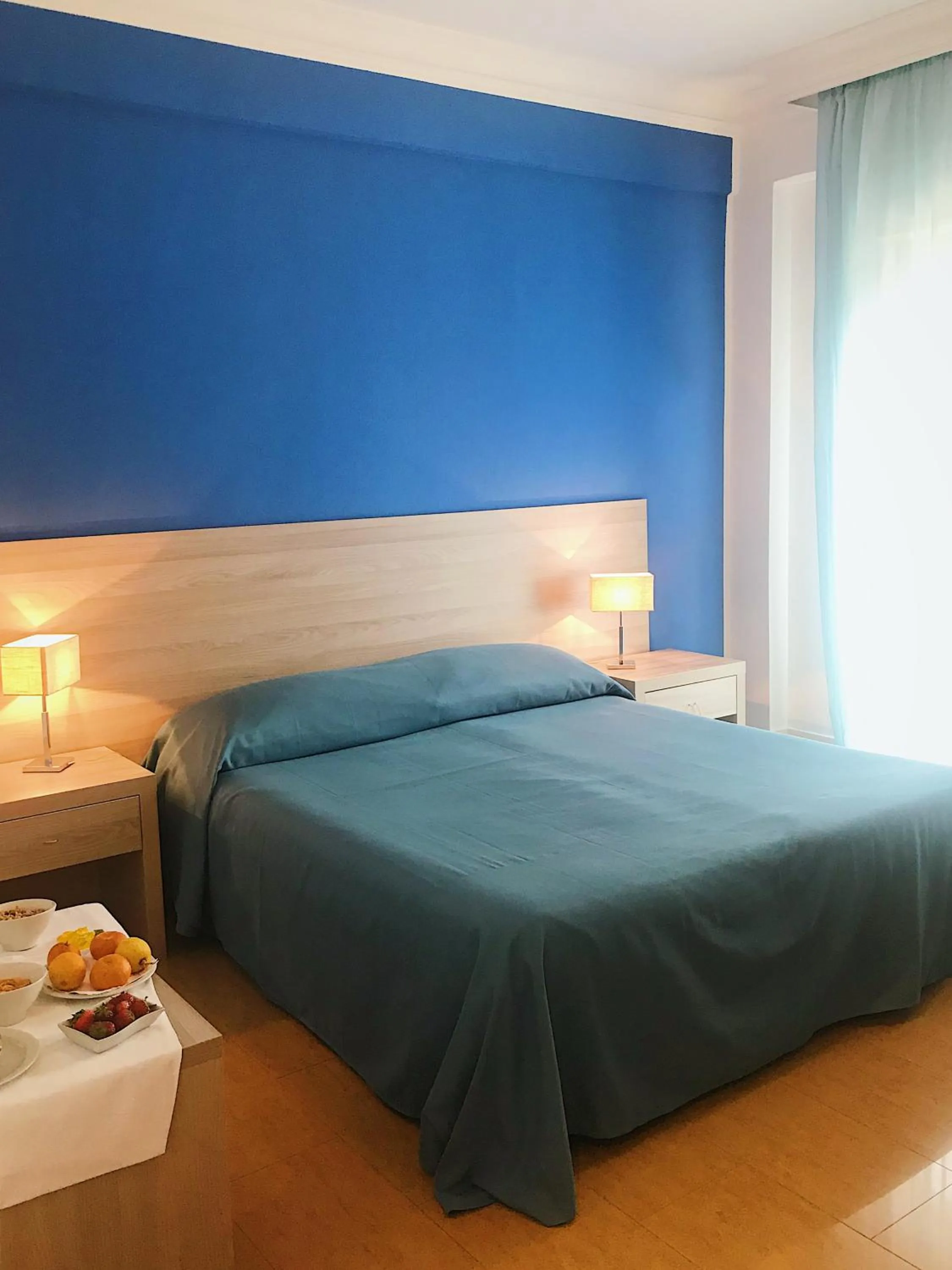 Bed in Hotel Conchiglia d'Oro