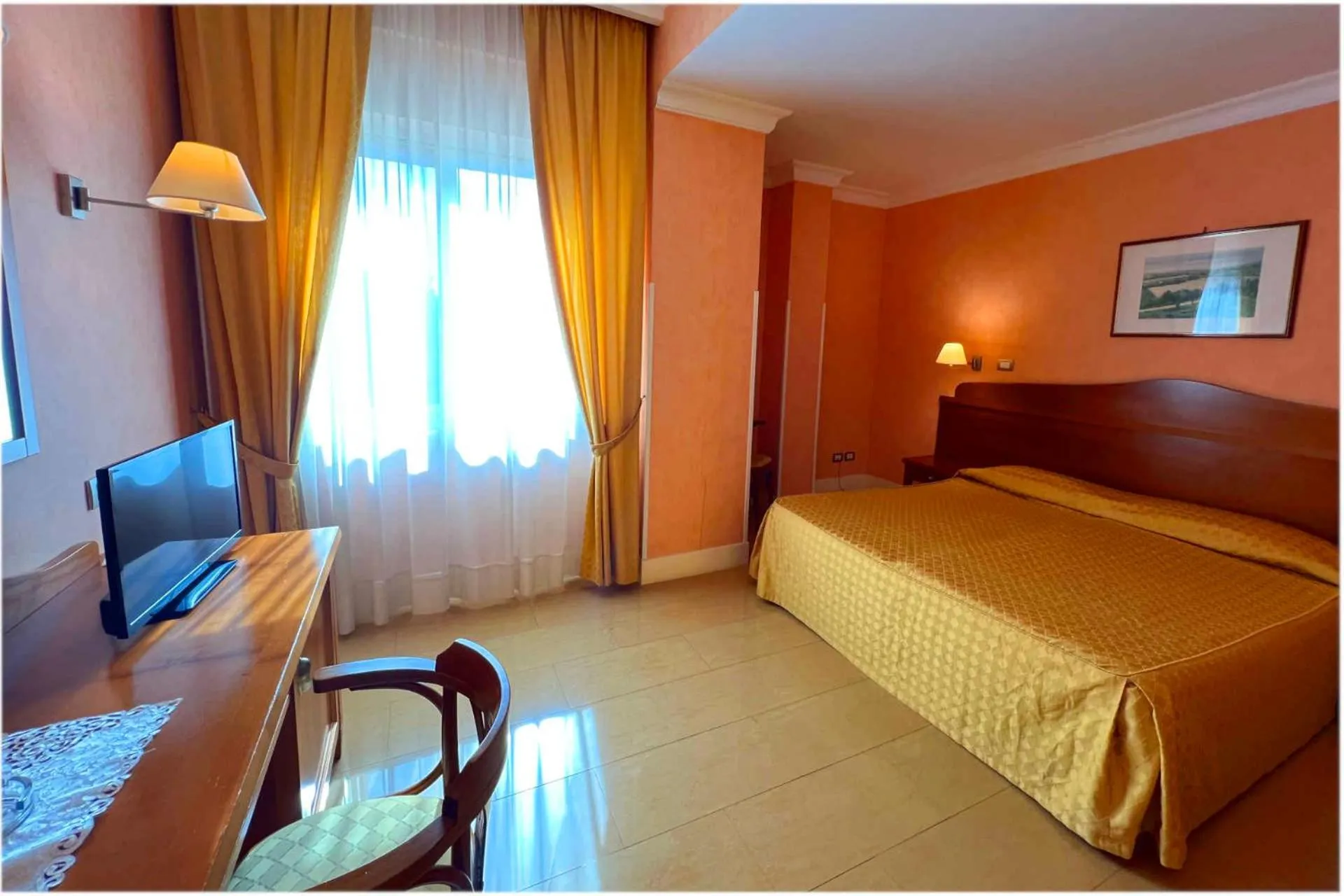 Bed in Hotel Conchiglia d'Oro