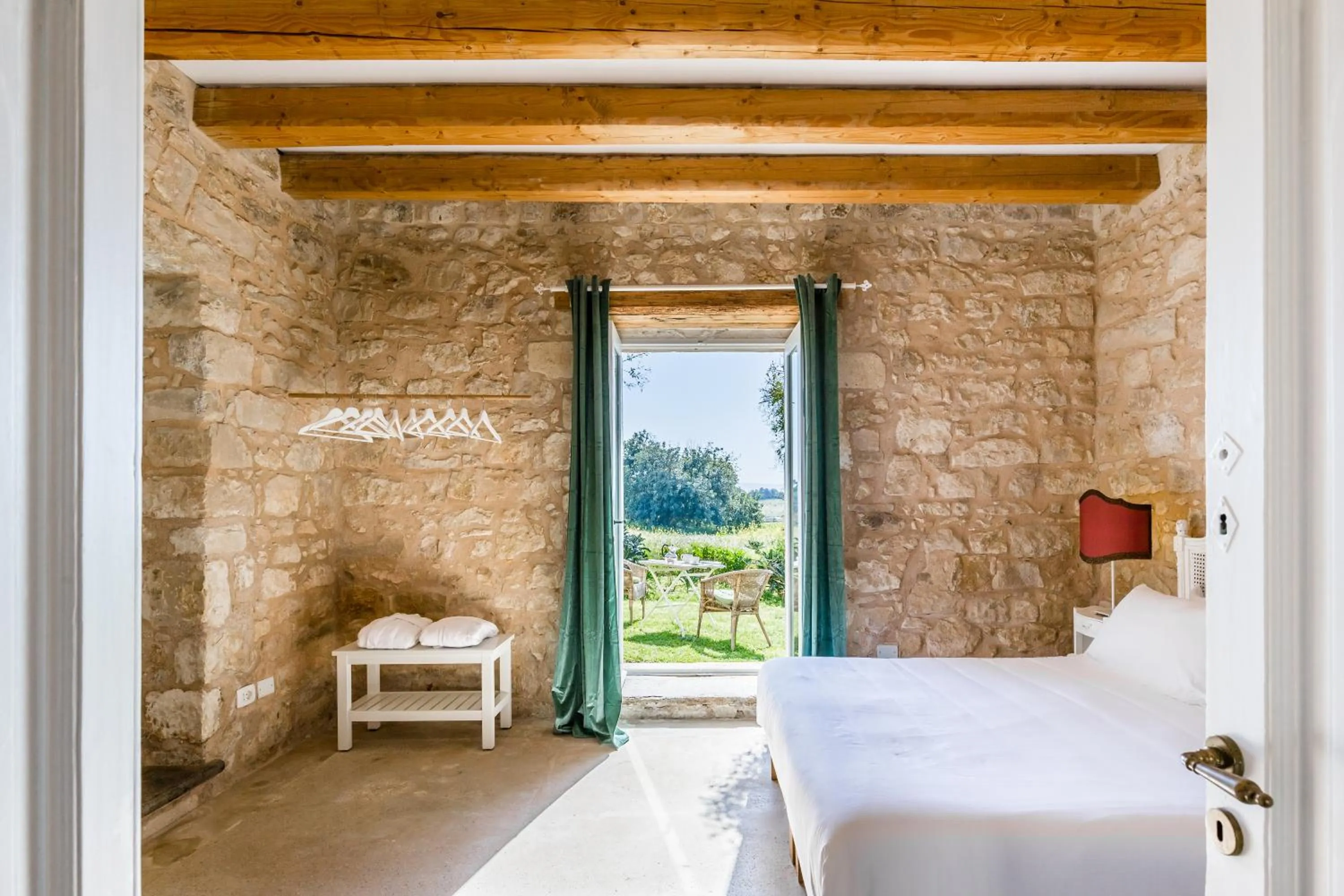 Photo of the whole room, Bed in Baglio Occhipinti