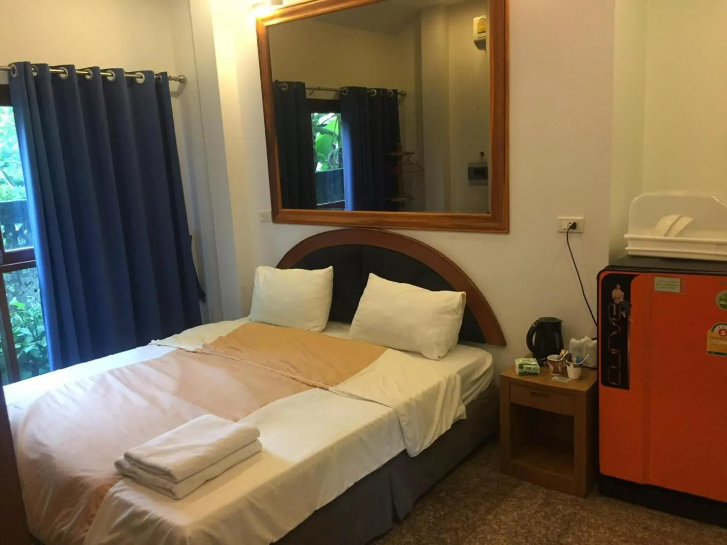 Bed in Damnoen Care Resort