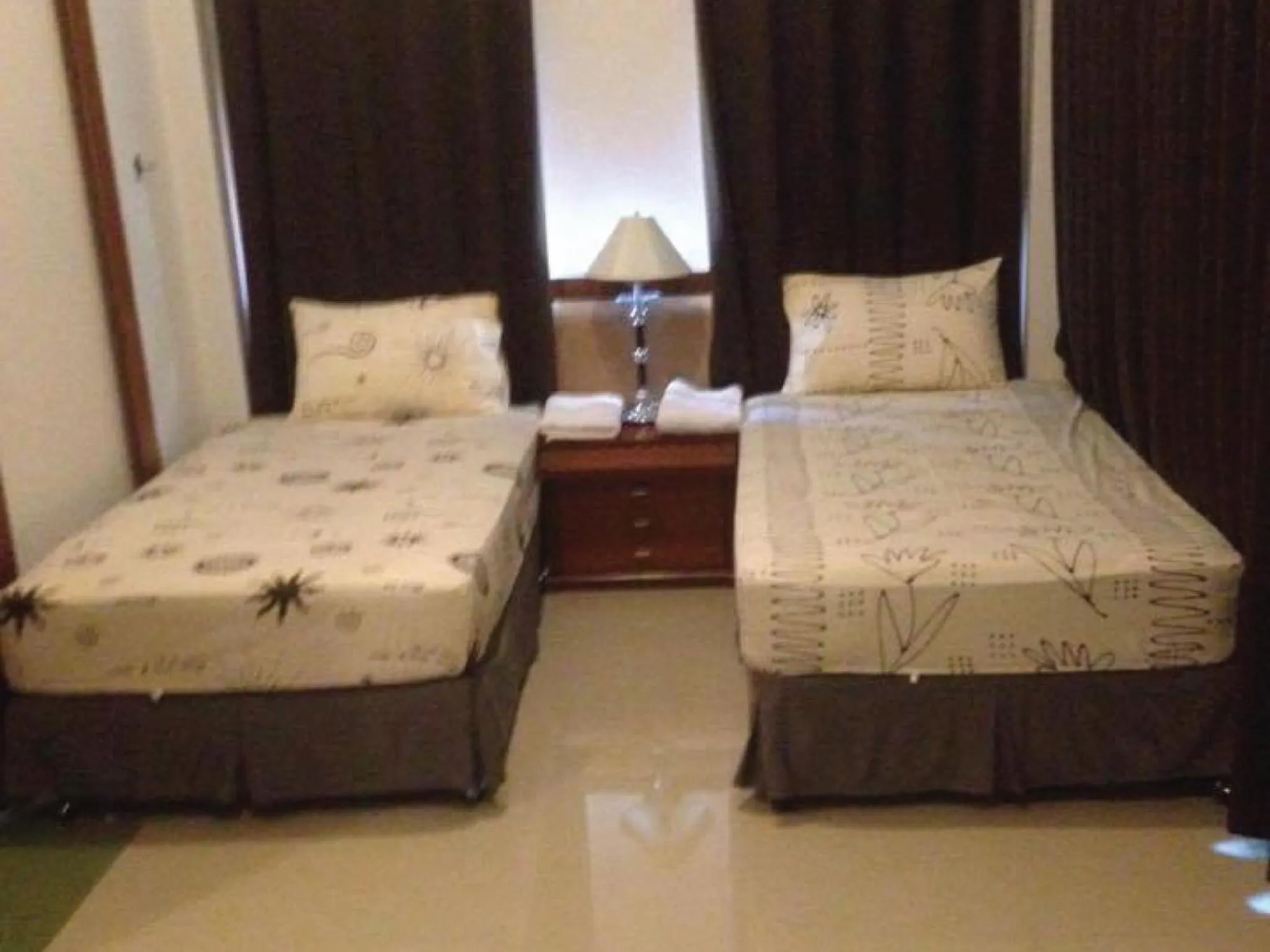 Bed in Damnoen Care Resort