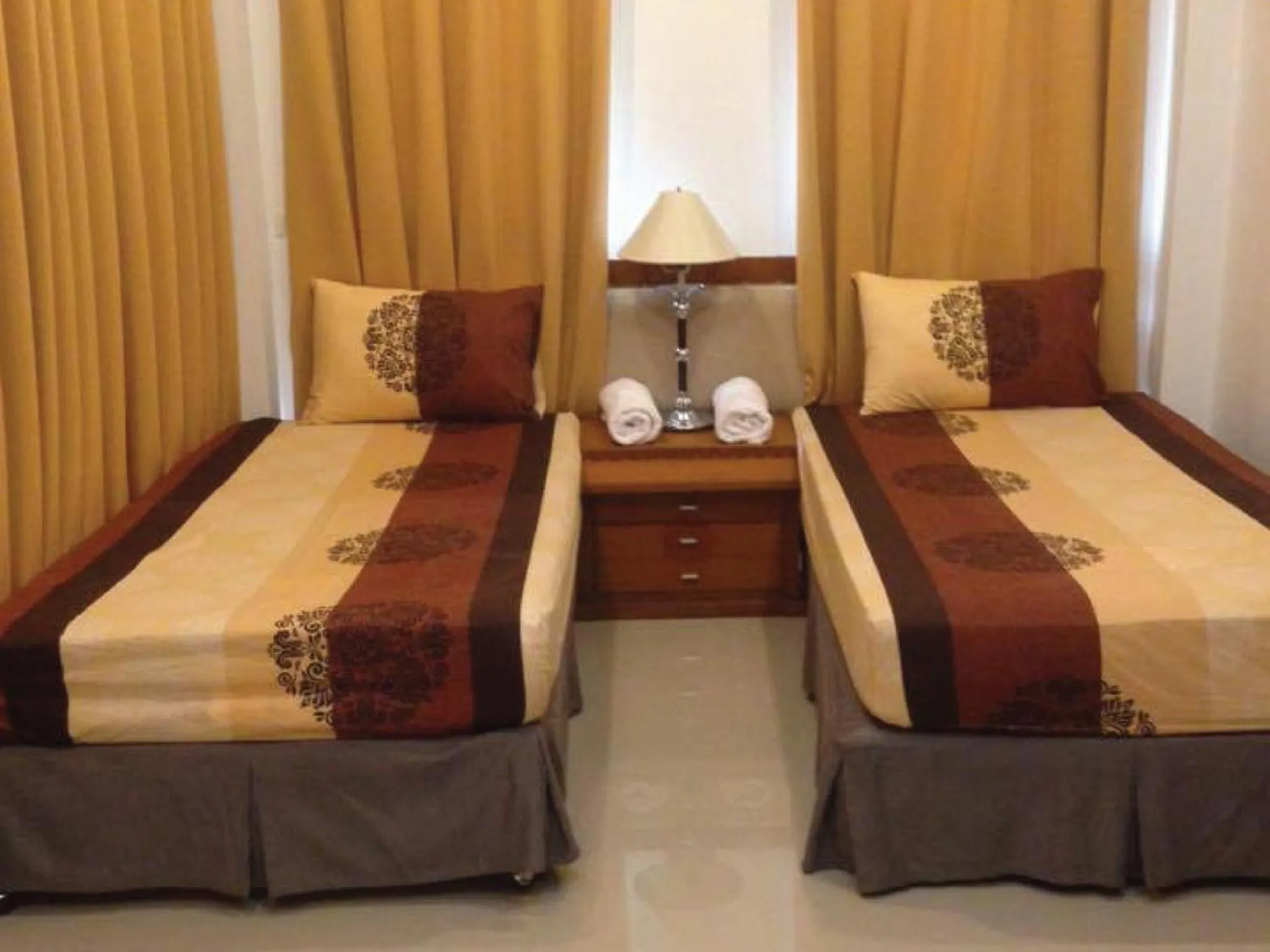 Bed in Damnoen Care Resort