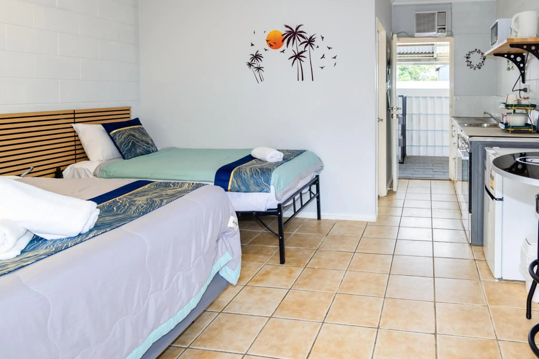 Bed in Innisfail Riverfront Motel