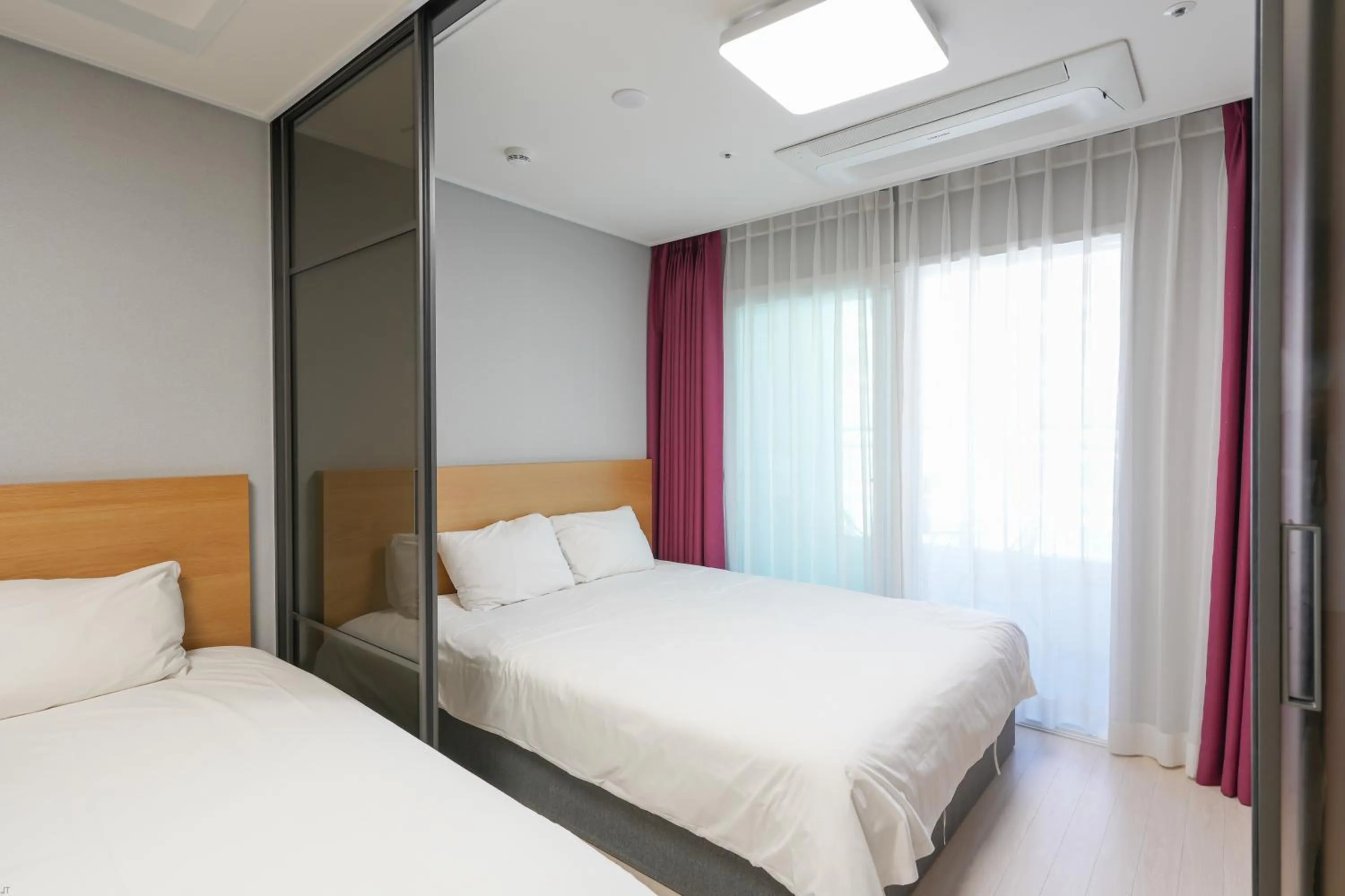 Bed in Firstcity Hotel YEOSU