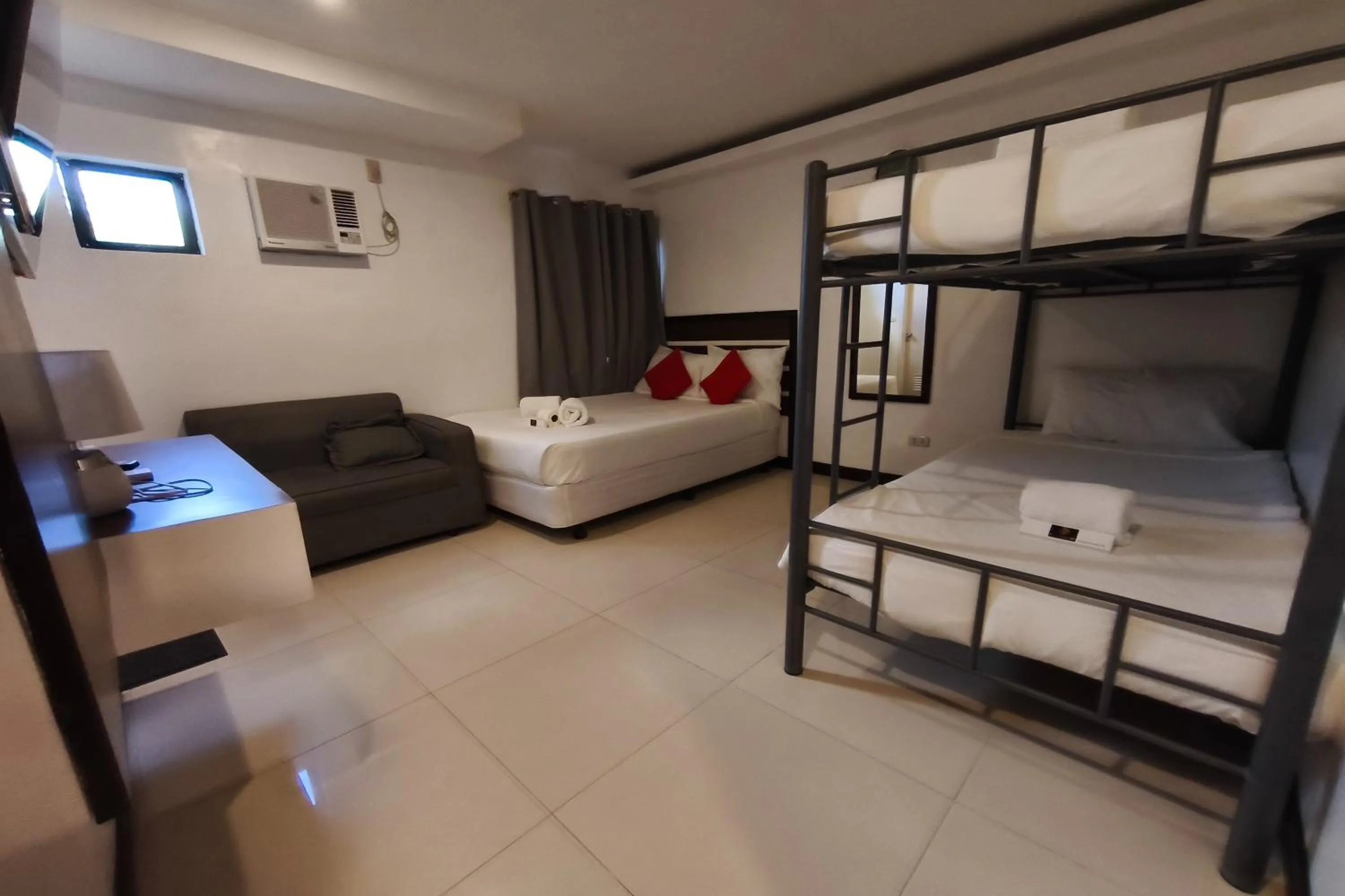 Photo of the whole room, Bed in Ecoland 88 Apartelle and Suite near SM Davao