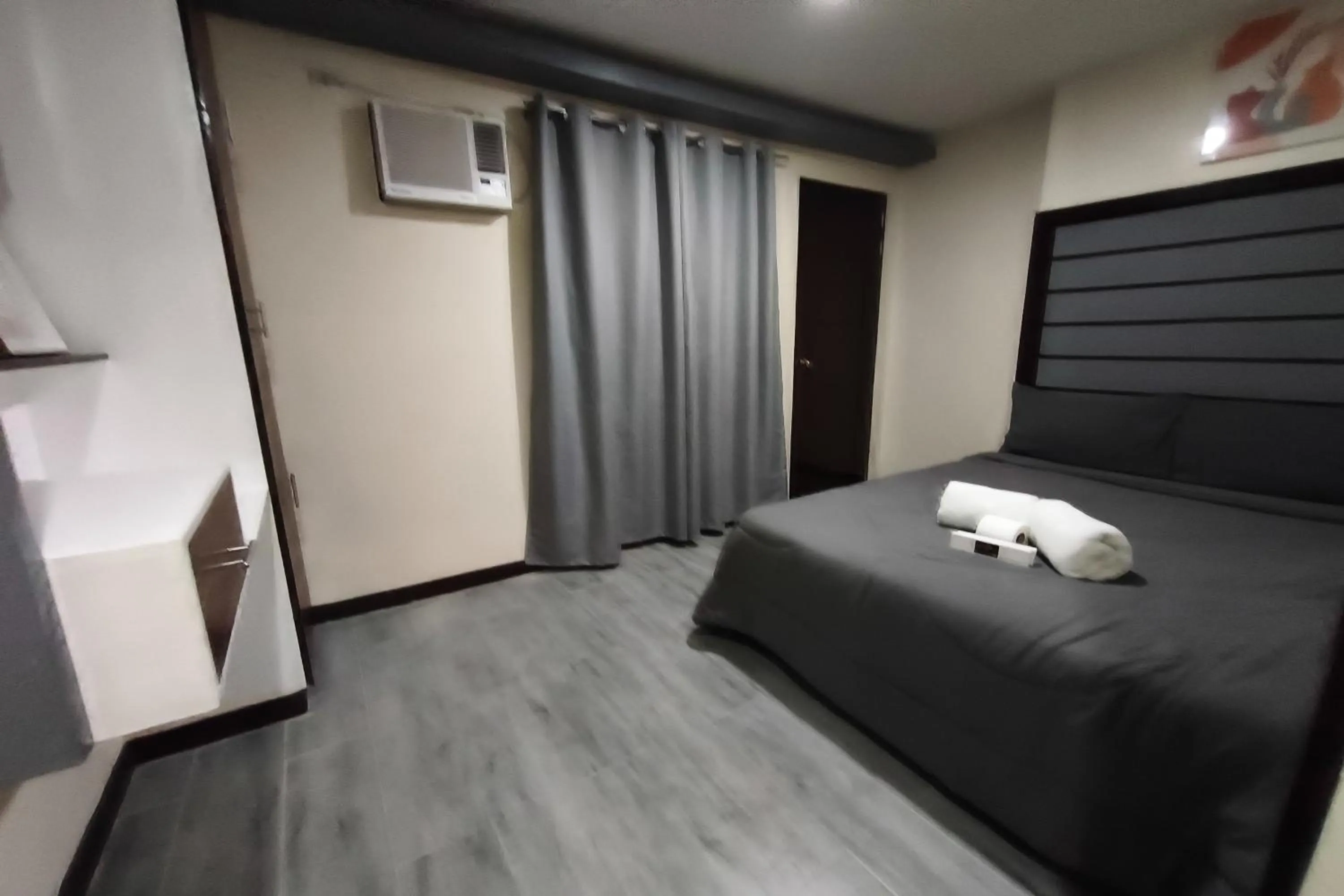 Photo of the whole room, Bed in Ecoland 88 Apartelle and Suite near SM Davao