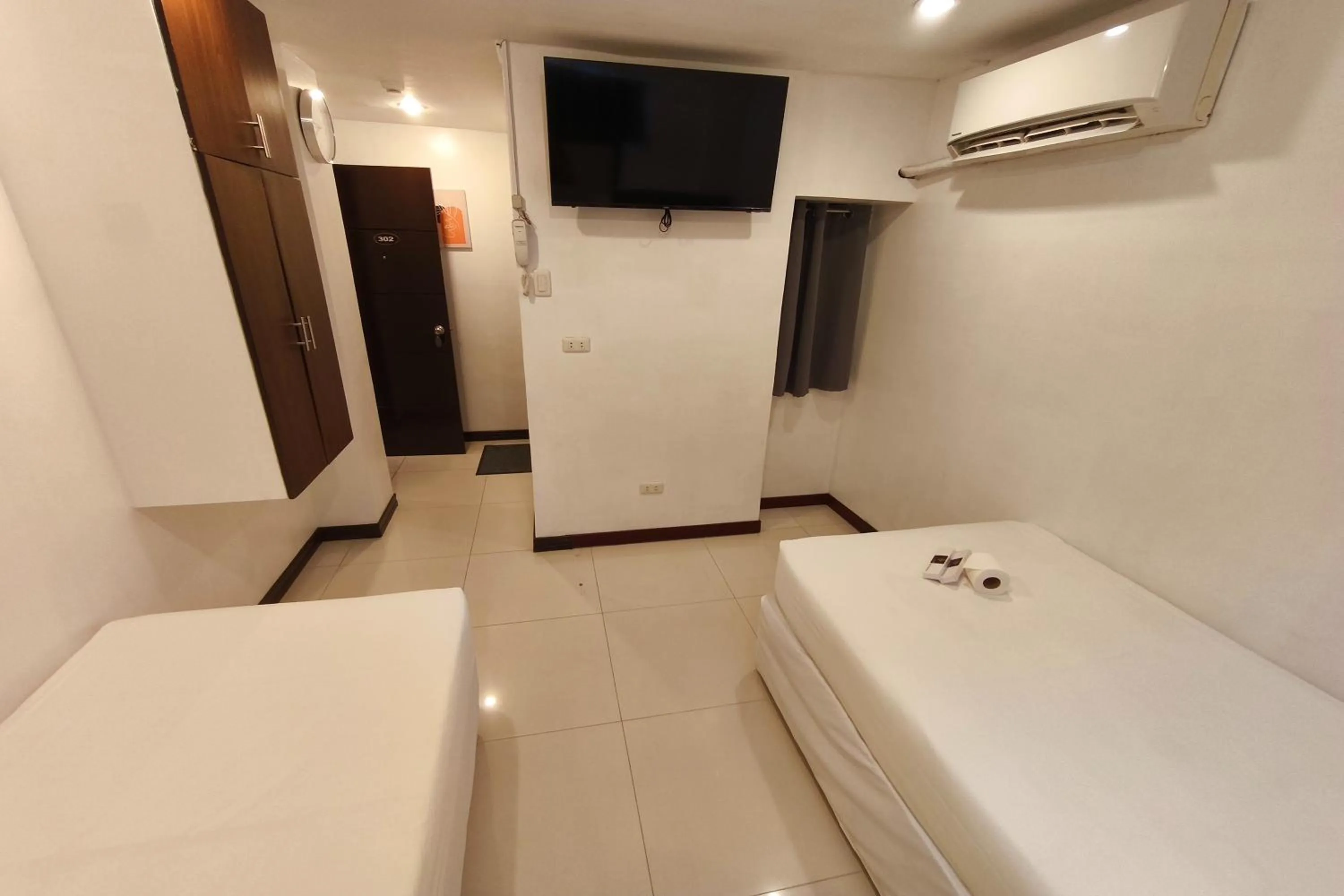 Photo of the whole room, Bed in Ecoland 88 Apartelle and Suite near SM Davao