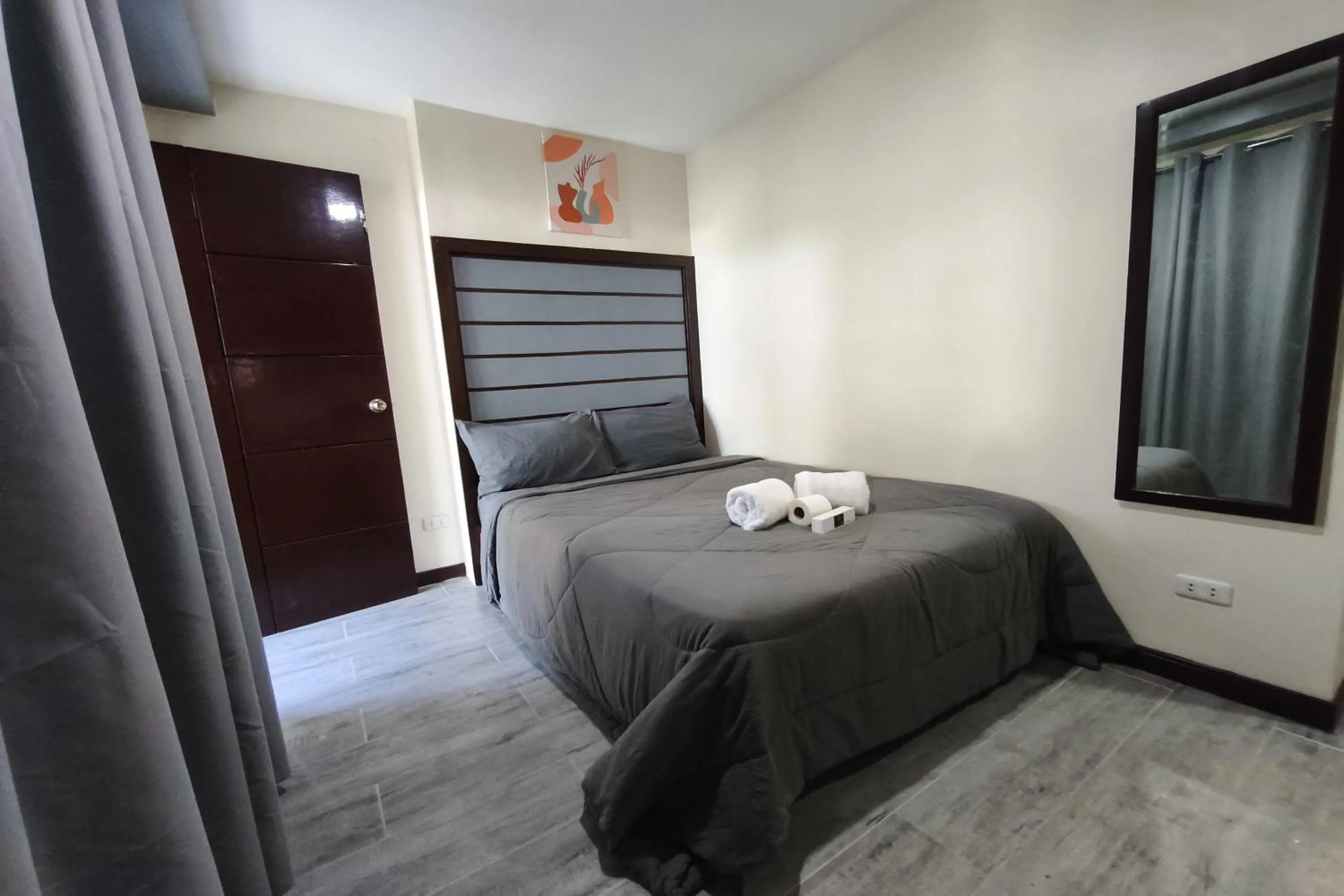 Photo of the whole room, Bed in Ecoland 88 Apartelle and Suite near SM Davao