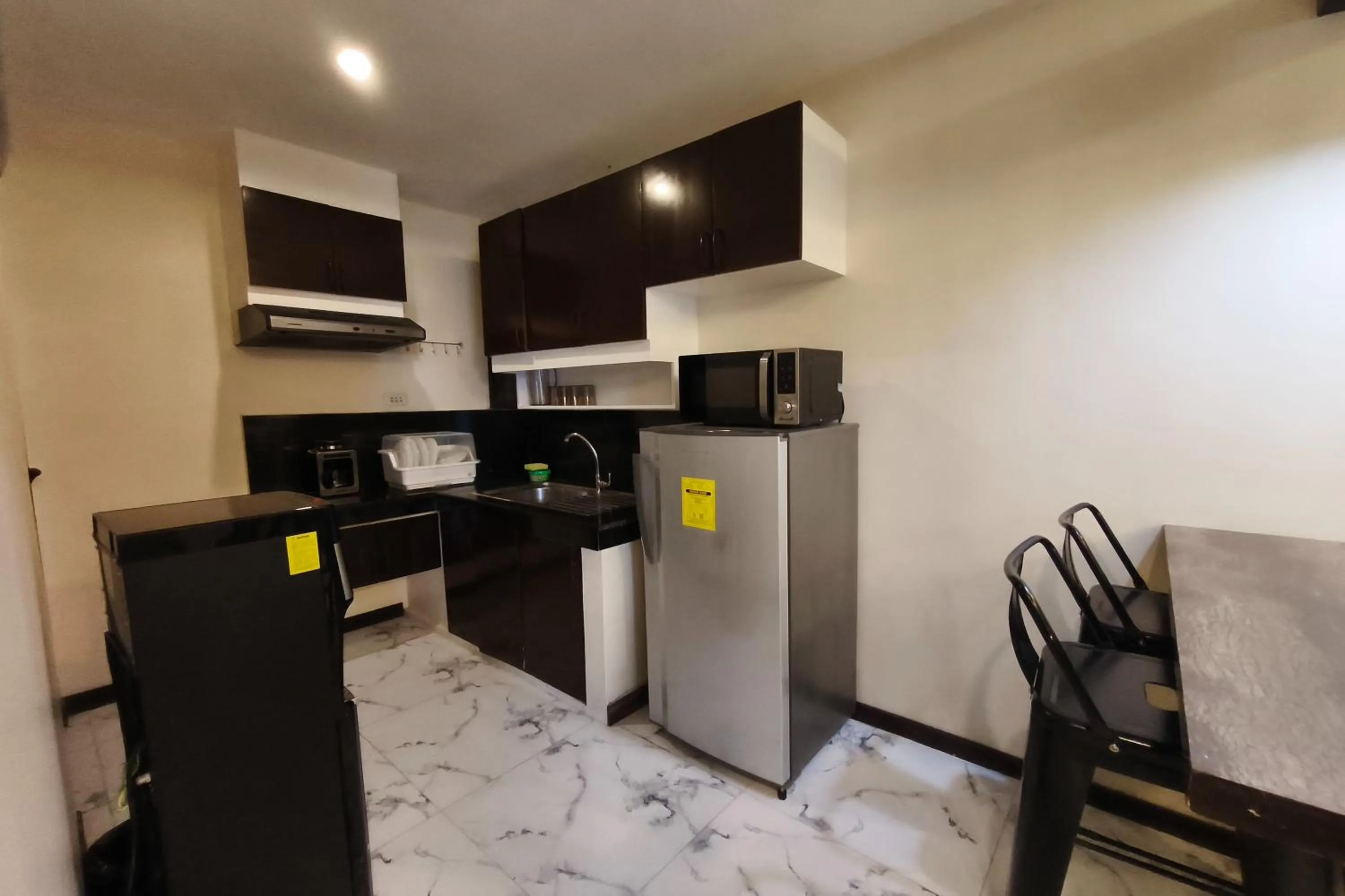 Kitchen or kitchenette in Ecoland 88 Apartelle and Suite near SM Davao