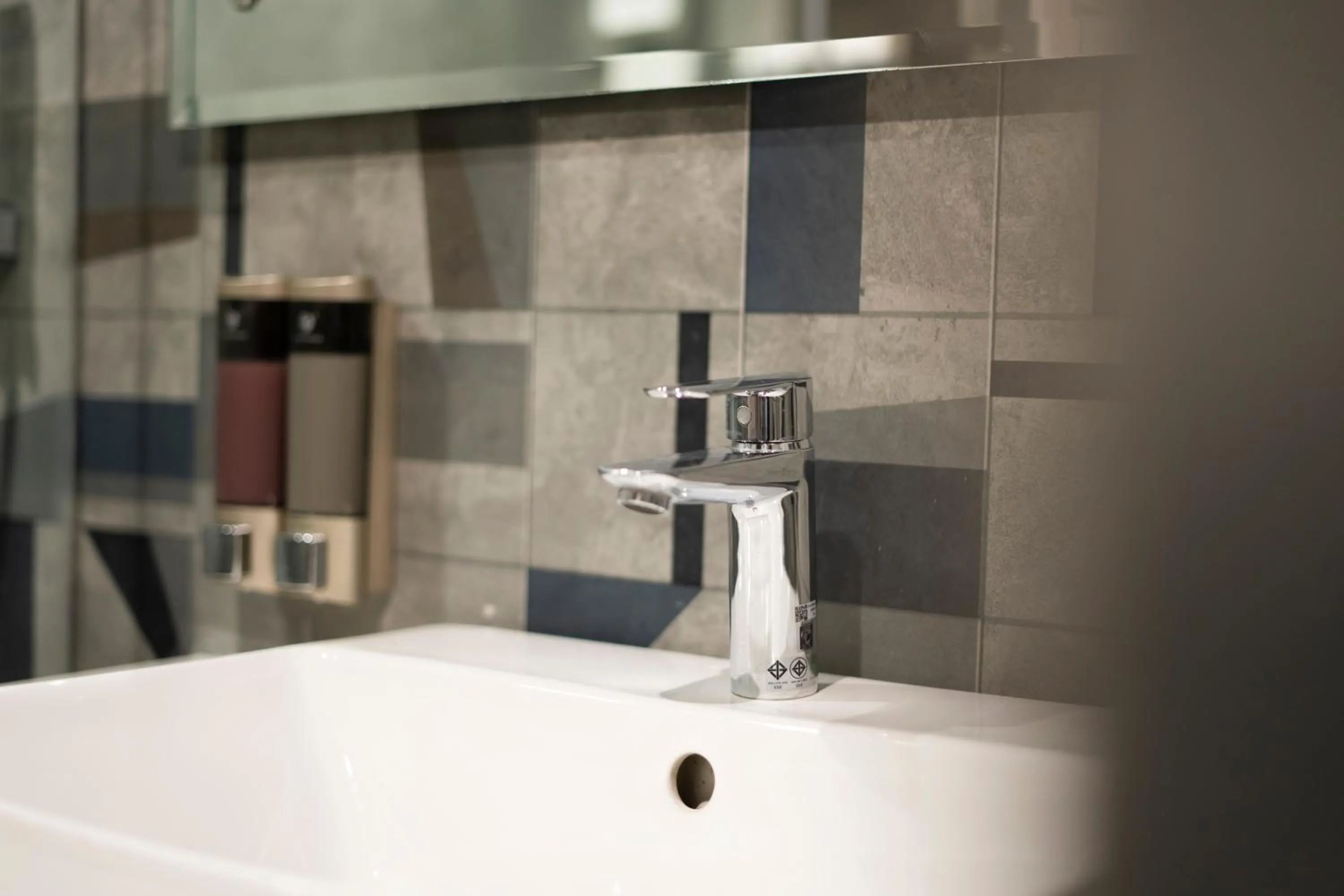 Bathroom in Clubhouse Hotel by CheckIn Chandigarh Mohali