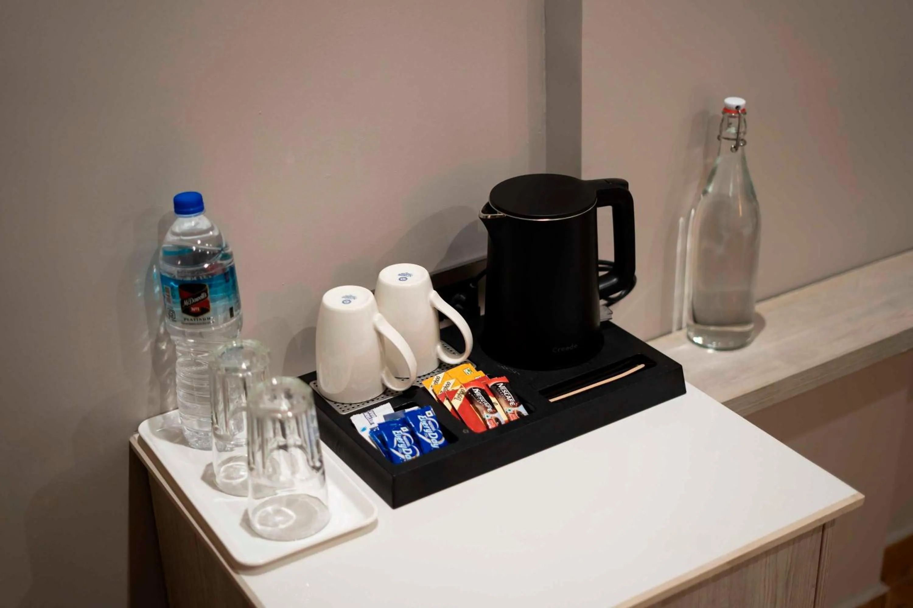 Kitchen or kitchenette in Clubhouse Hotel by CheckIn Chandigarh Mohali