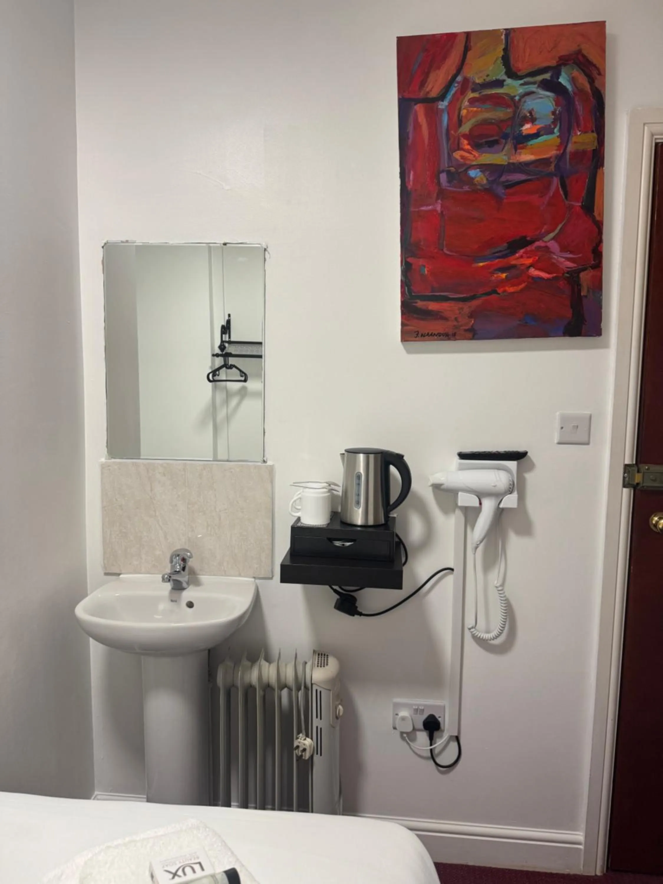 Bedroom in Romany House Hotel