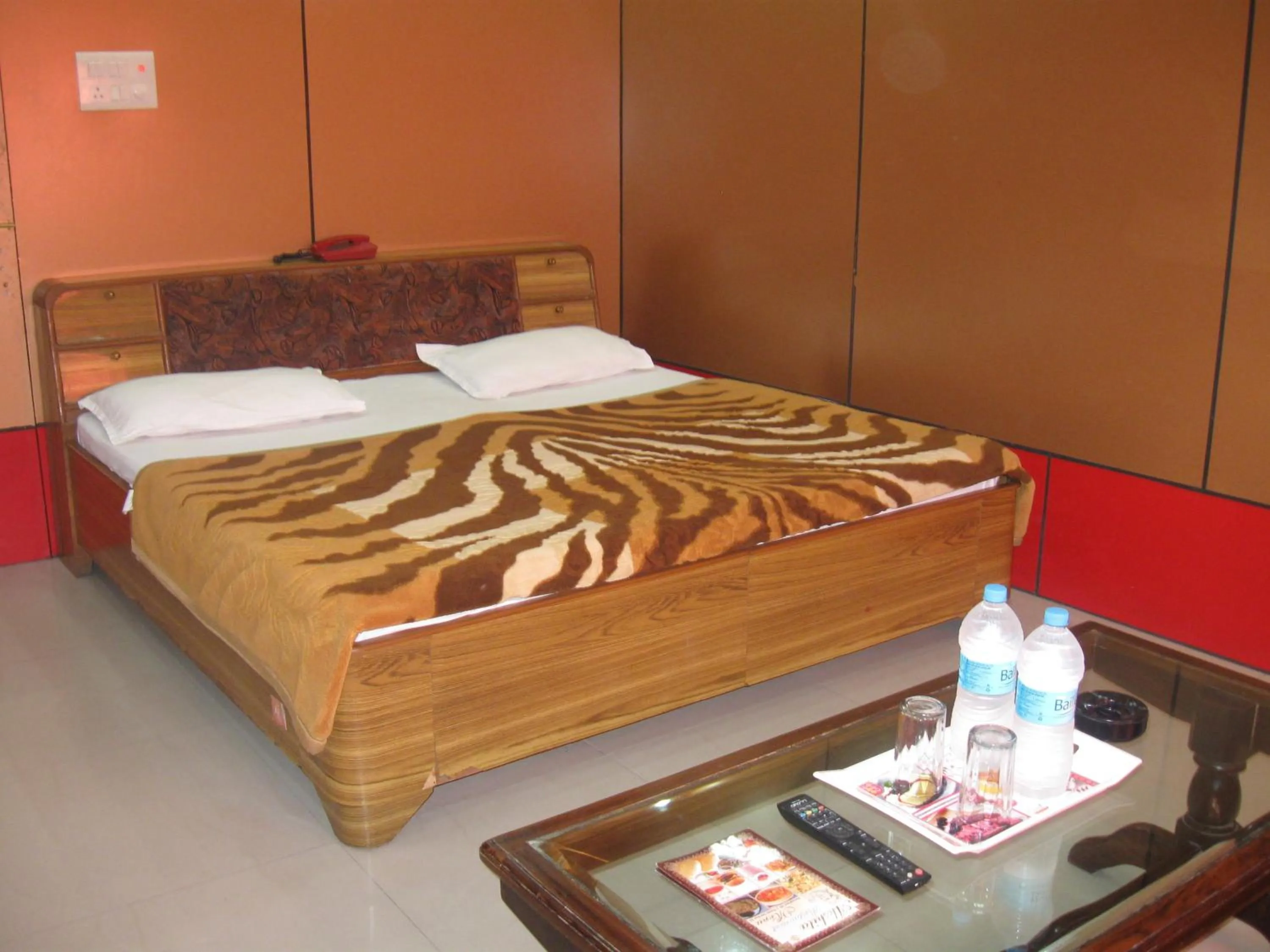 Bed in Hotel Shiv Ganga