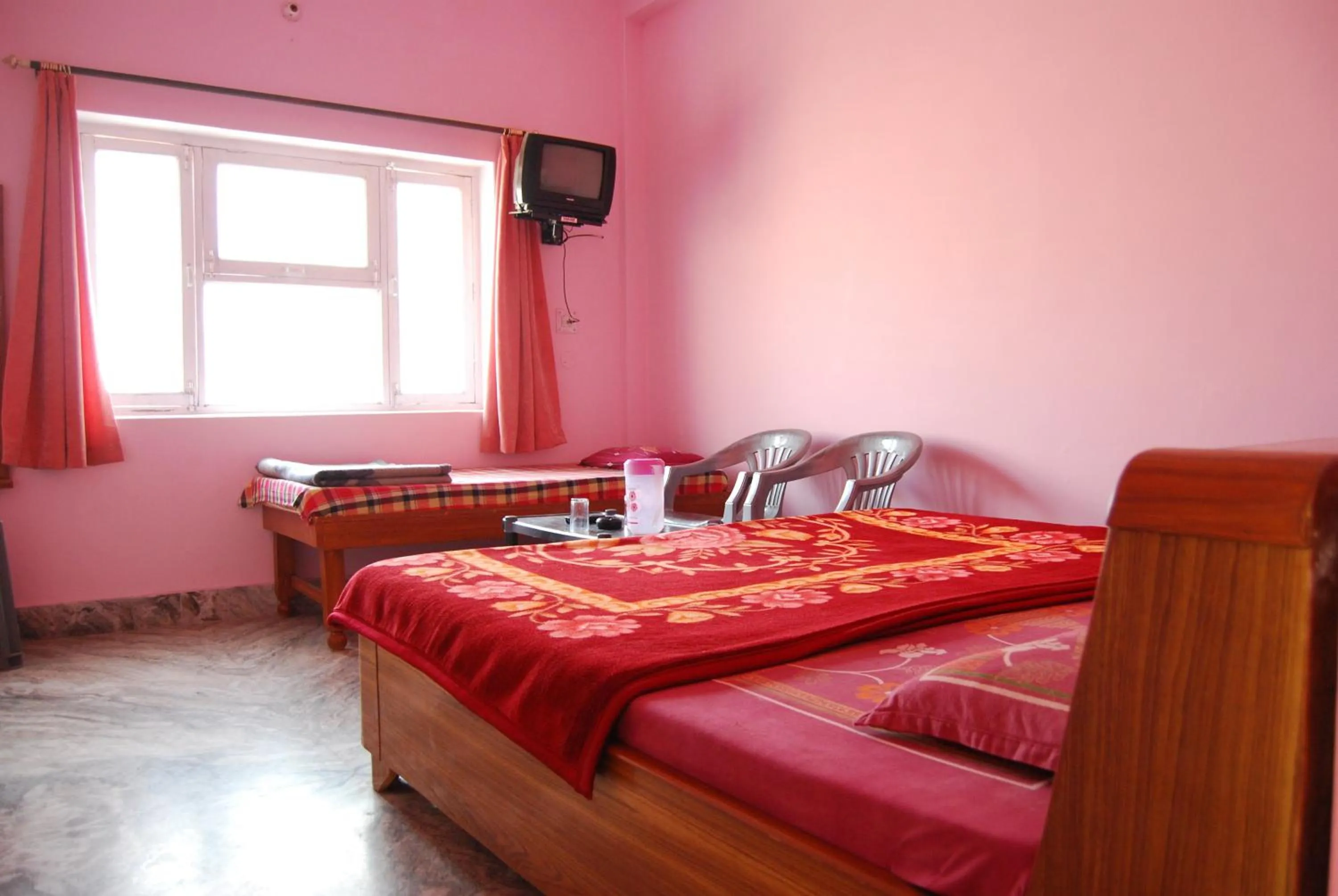 Bed in Hotel Shiv Ganga