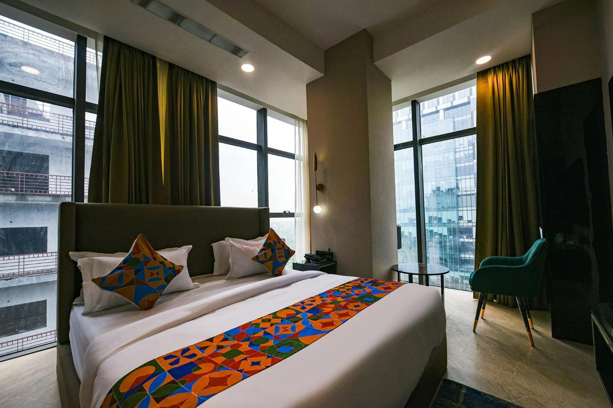 Bed in FabHotel Prime Elegance Suites