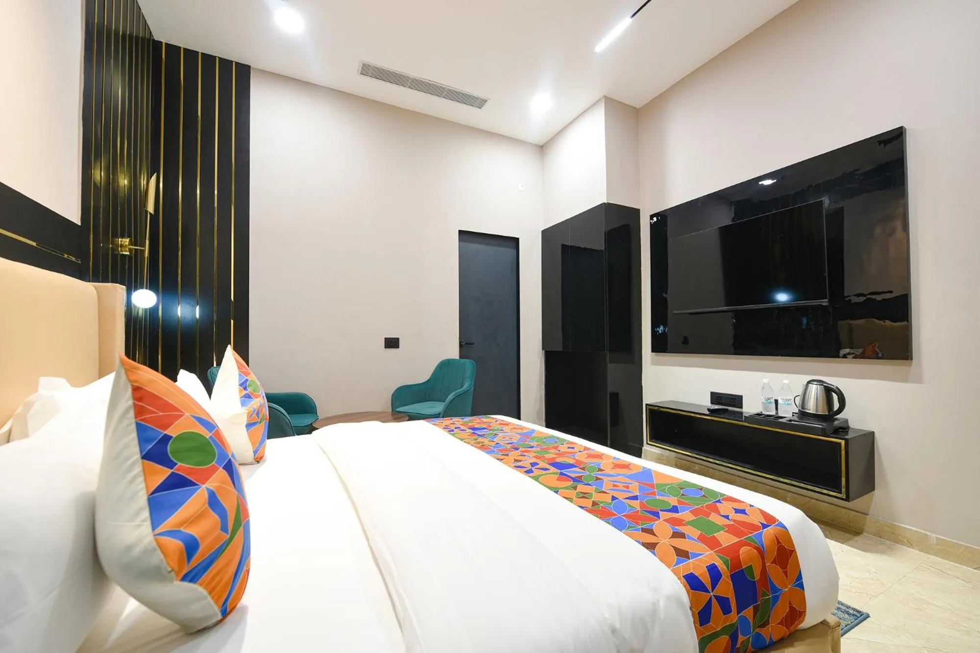 Bed in FabHotel Prime Elegance Suites