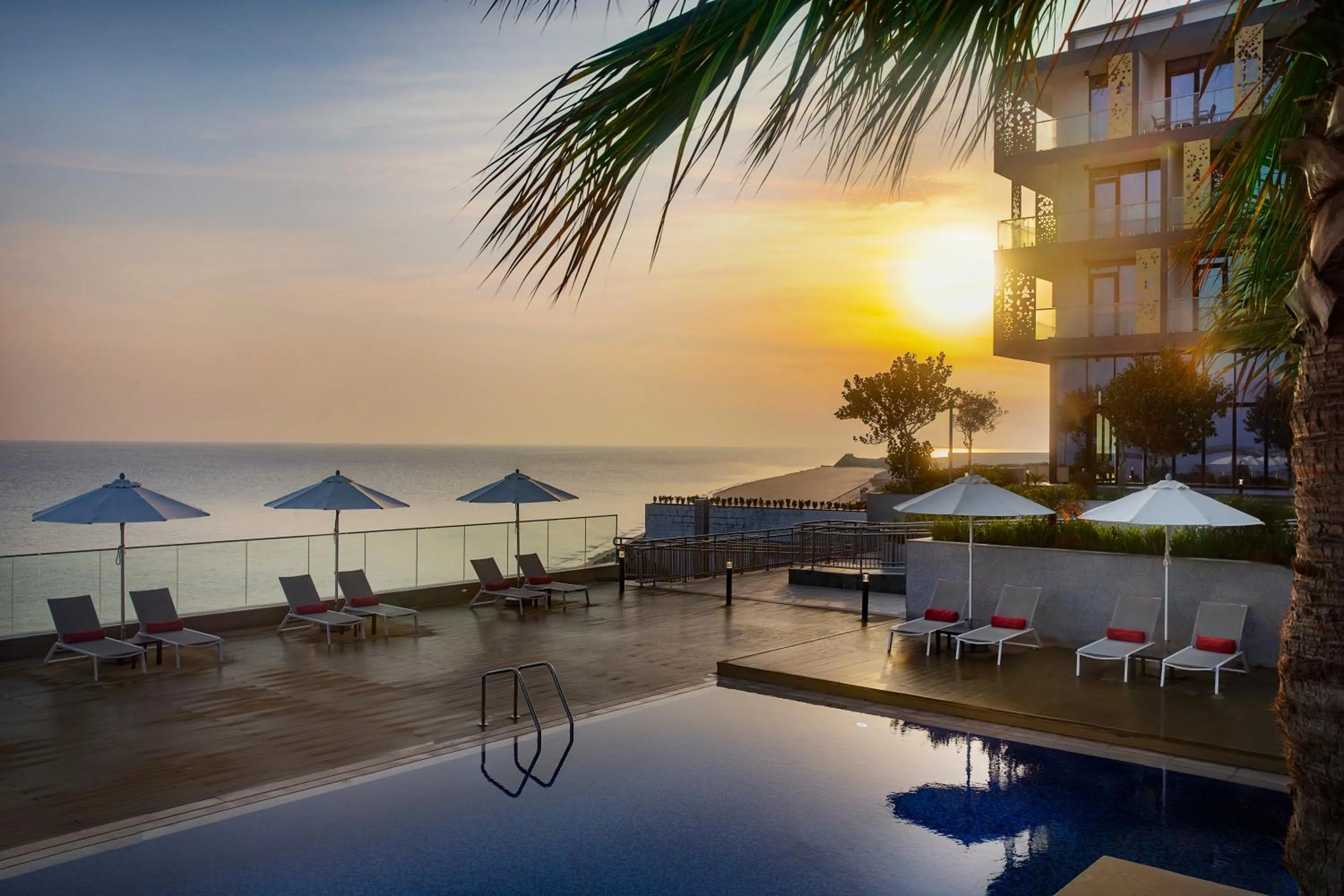 Swimming pool in Beach Bay Hotel Mirfa