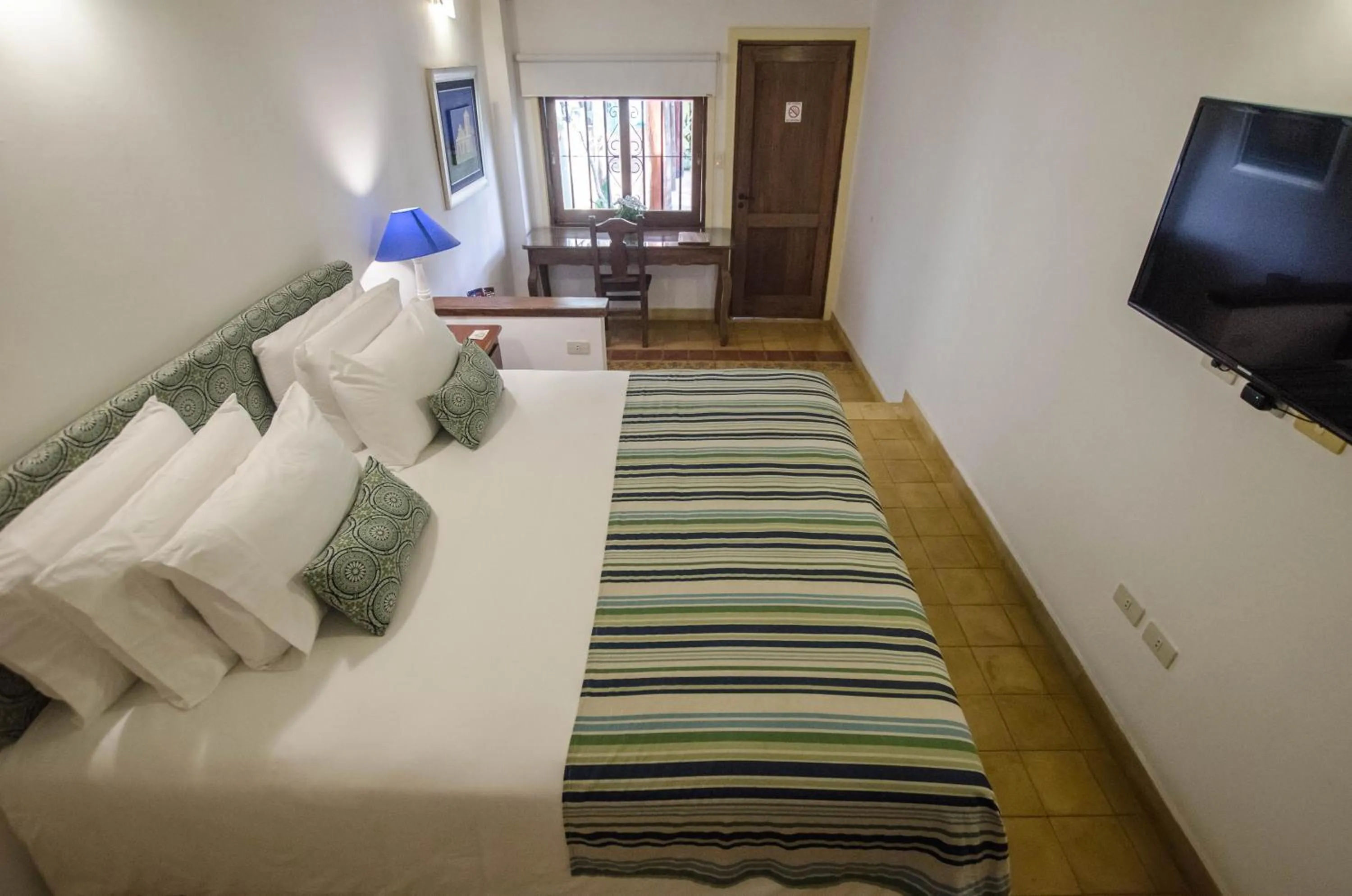 Bed in La Casona Hotel Boutique