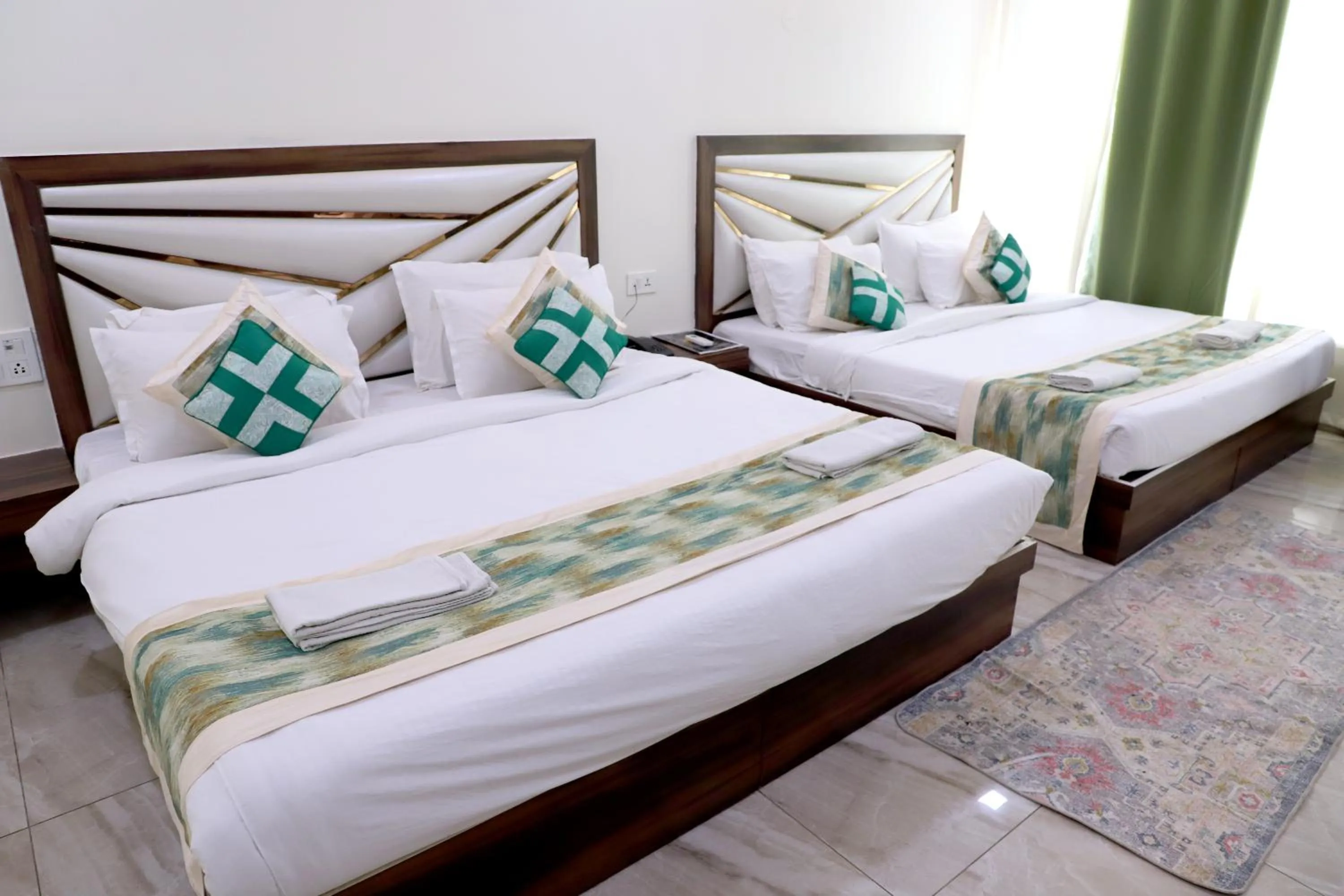 Bed in The Crown Hotel Agra near Taj Mahal & Restaurant