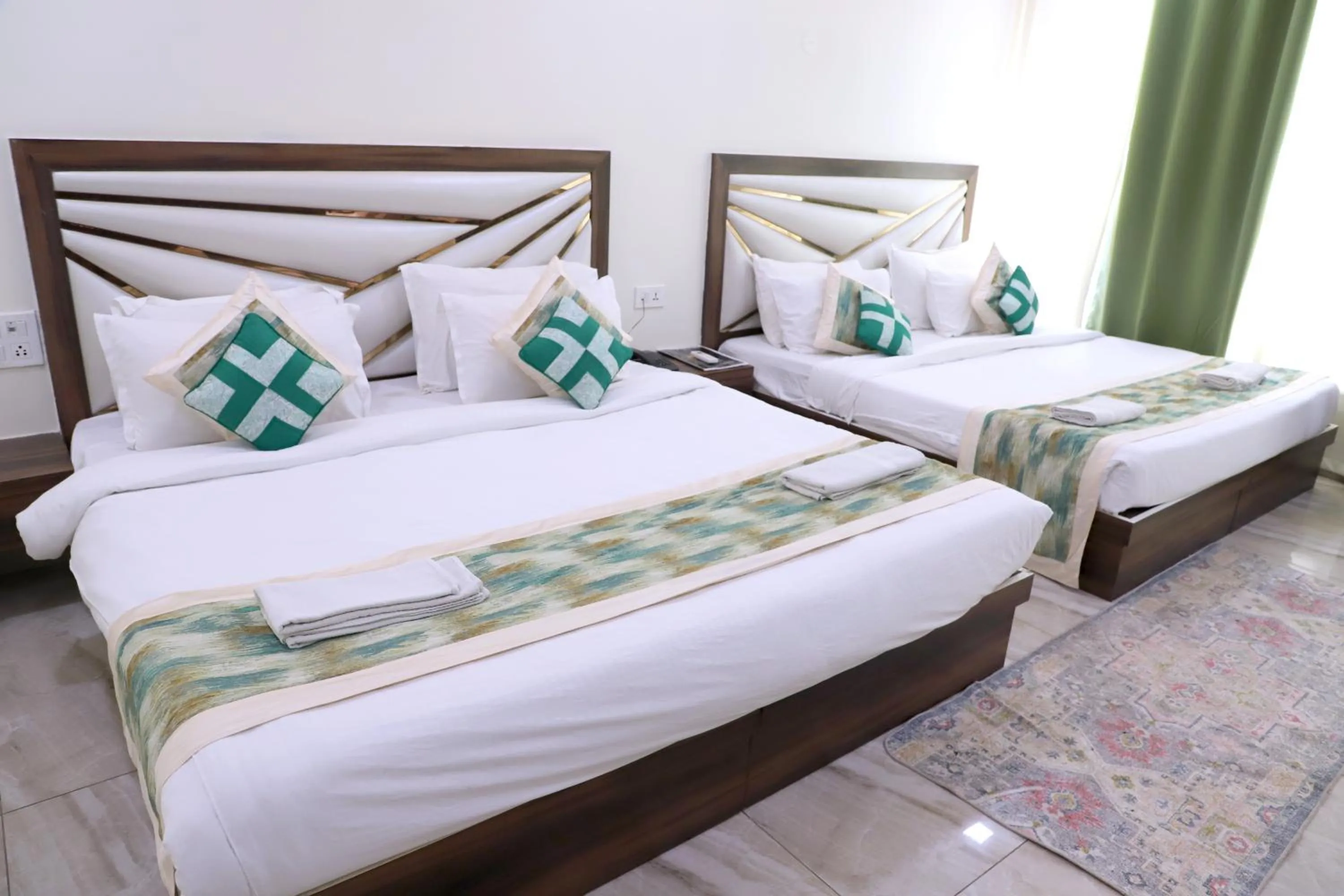 Bed in The Crown Hotel Agra near Taj Mahal & Restaurant