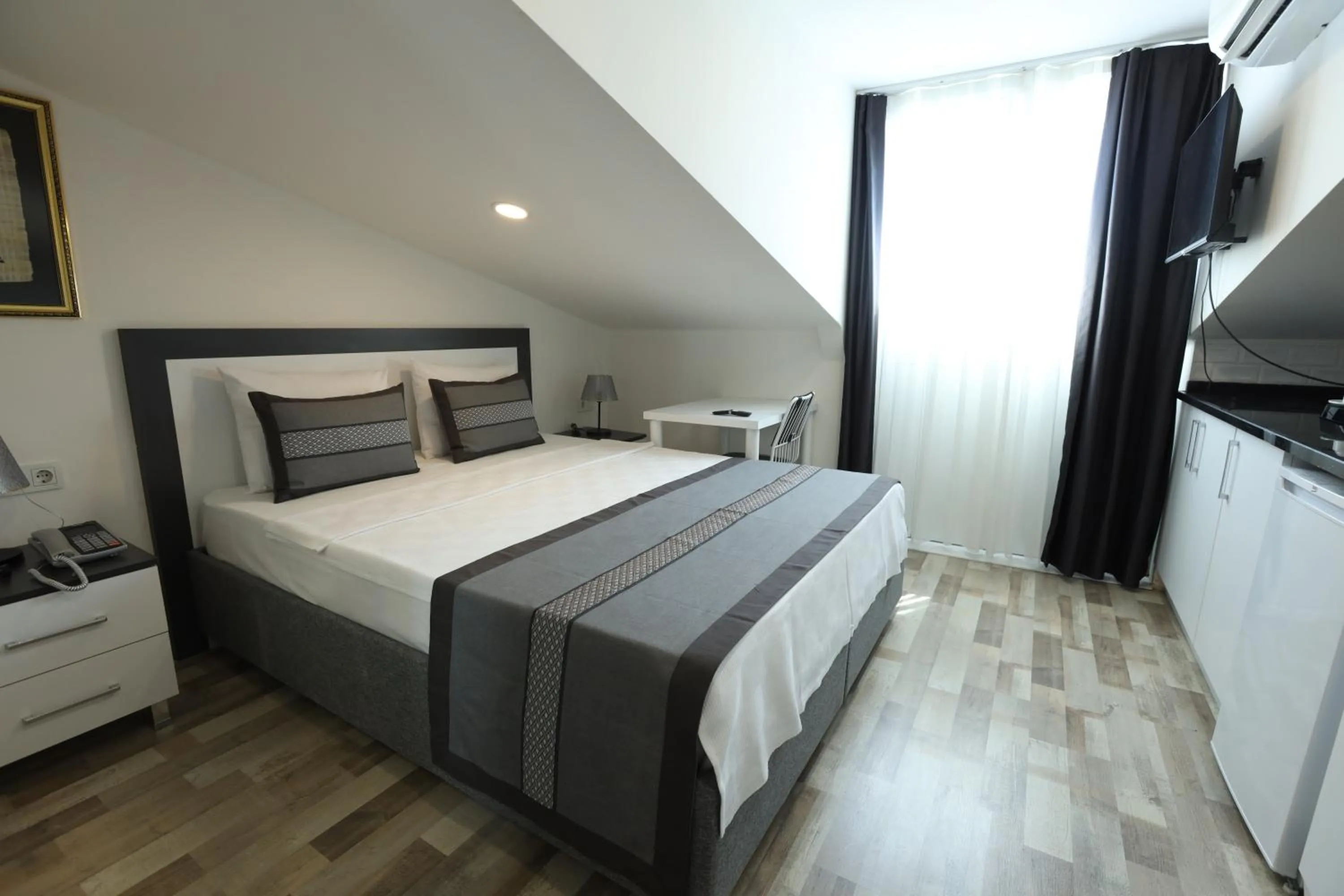 Bed in Askadar Çatı Otel