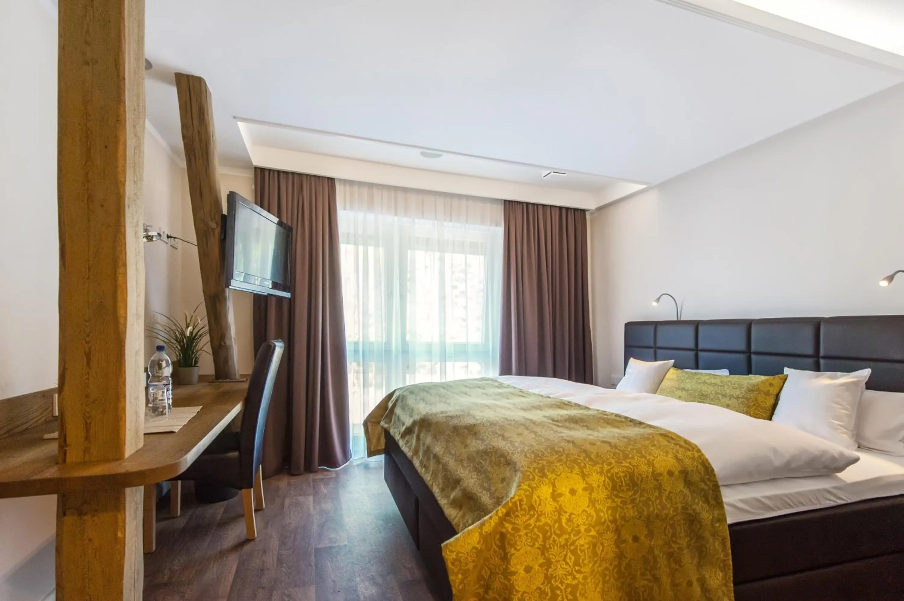 Photo of the whole room, Bed in Die Edelkastanie