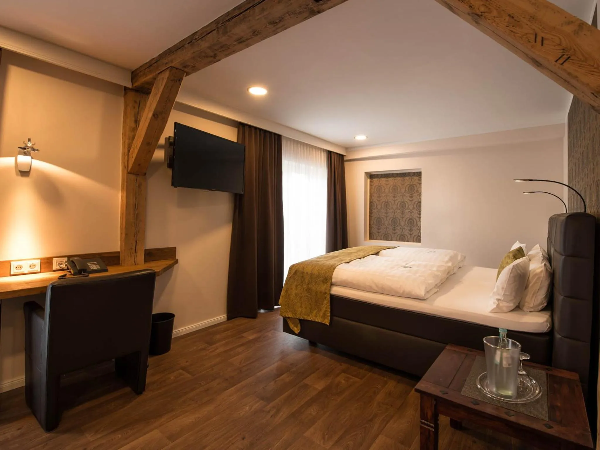 Photo of the whole room, Bed in Die Edelkastanie