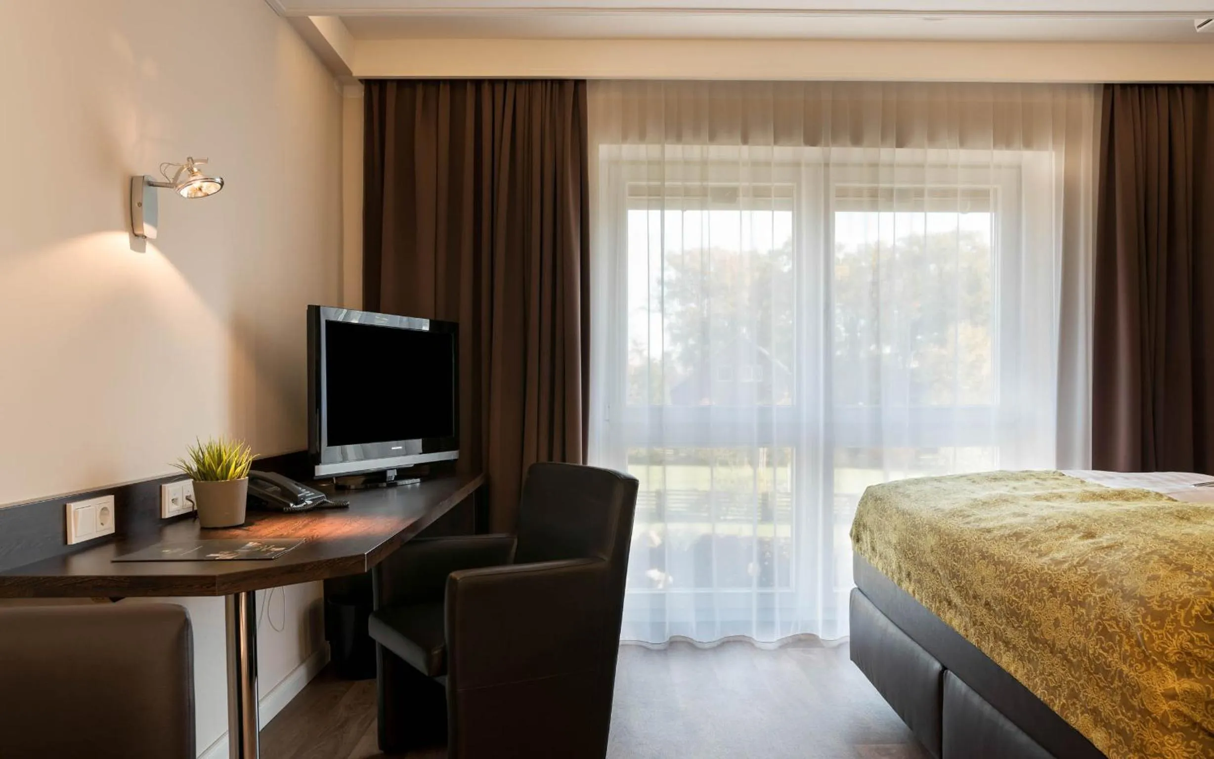 Photo of the whole room, Bed in Die Edelkastanie