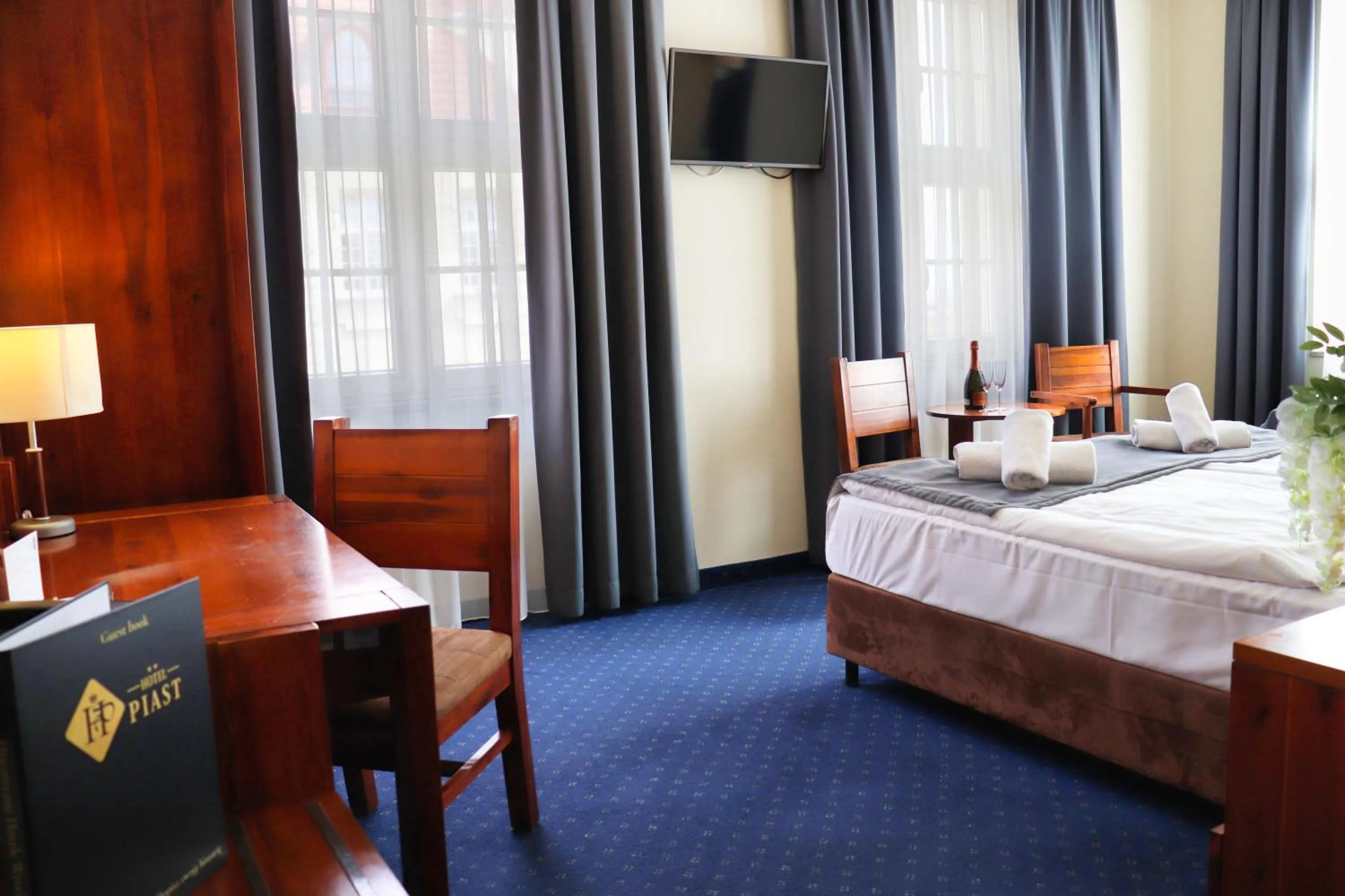 Photo of the whole room, Bed in Hotel Piast Wrocław Centrum