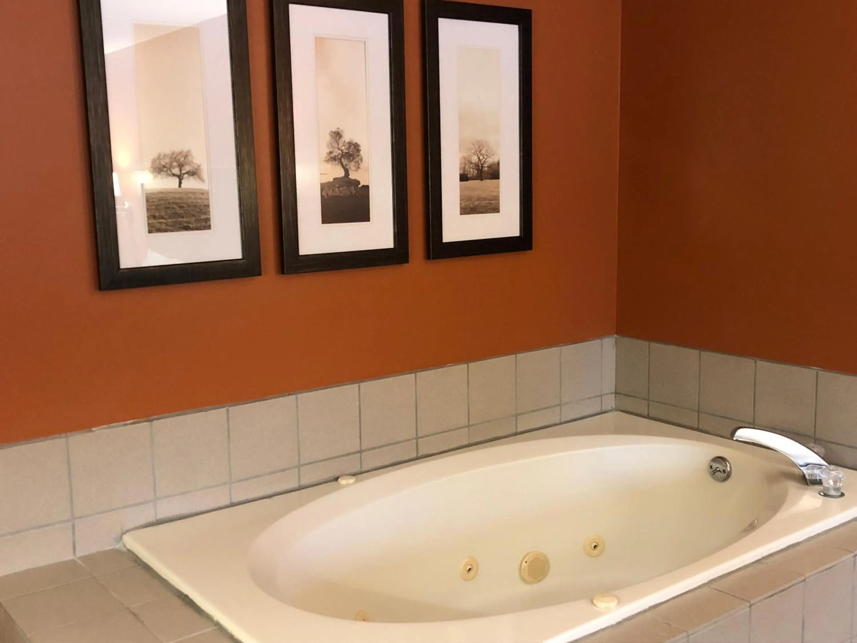 Bathroom in AmericInn by Wyndham Silver City