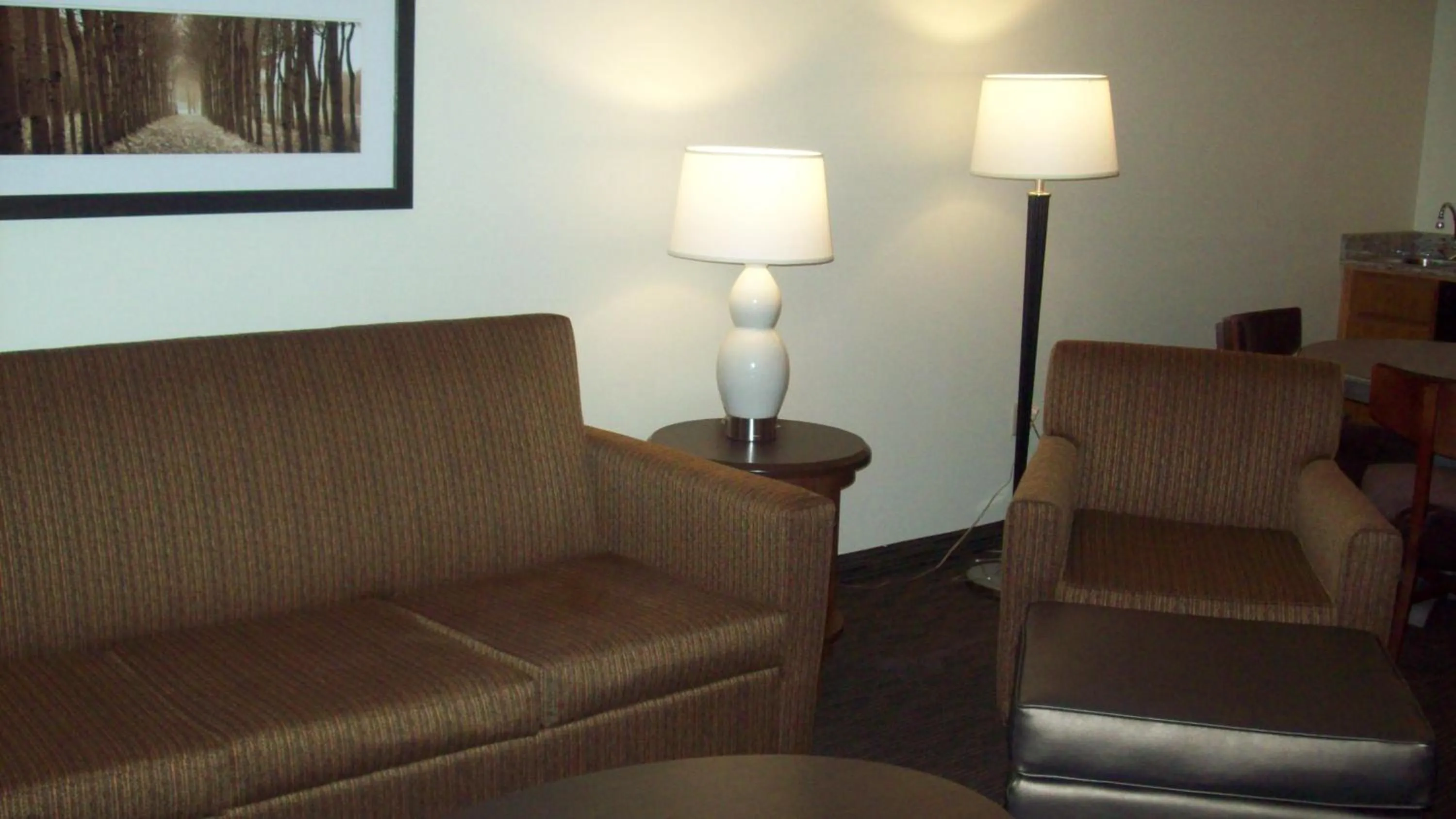 Seating area in AmericInn by Wyndham Silver City