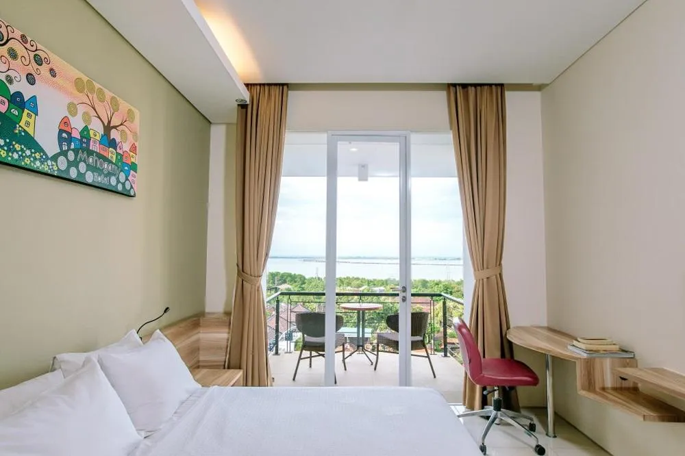 Bed in Mahogany Hotel