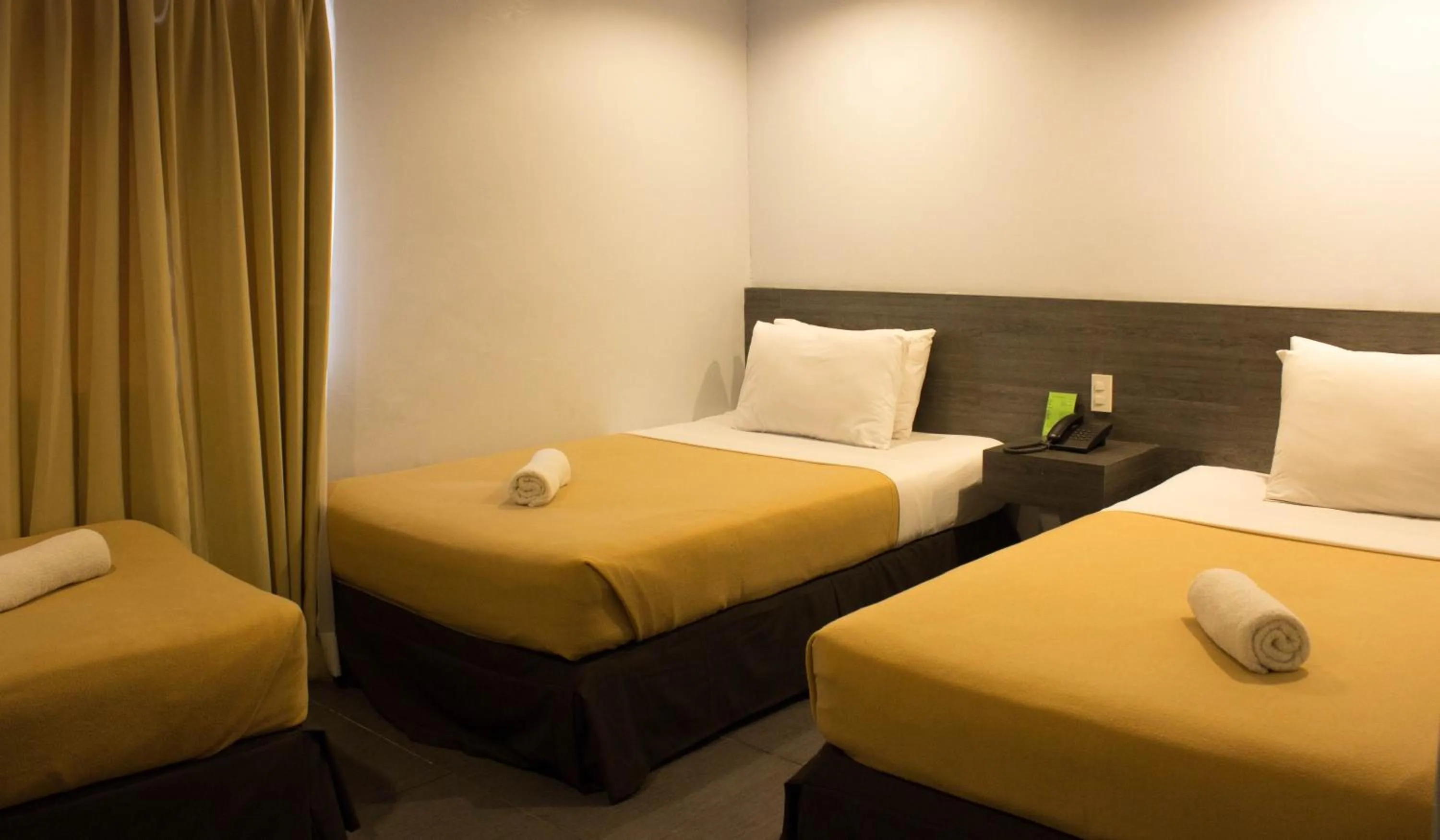 Photo of the whole room, Bed in Cebu R Hotel Mabolo