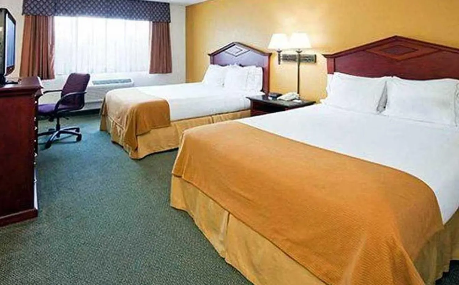 Bed in Blue Way Inn Eagan Extended Stay