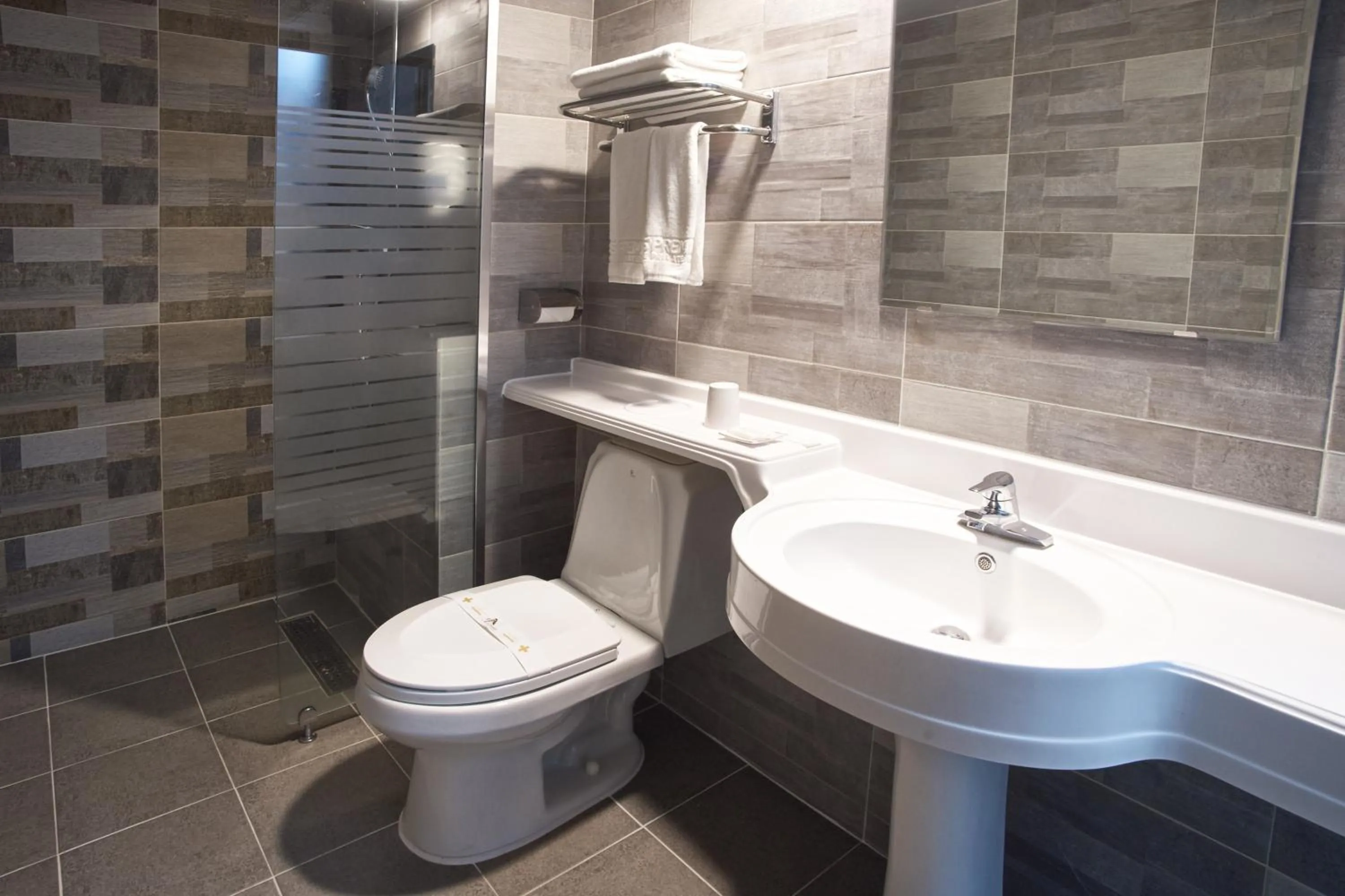 Bathroom in CS Premier Hotel