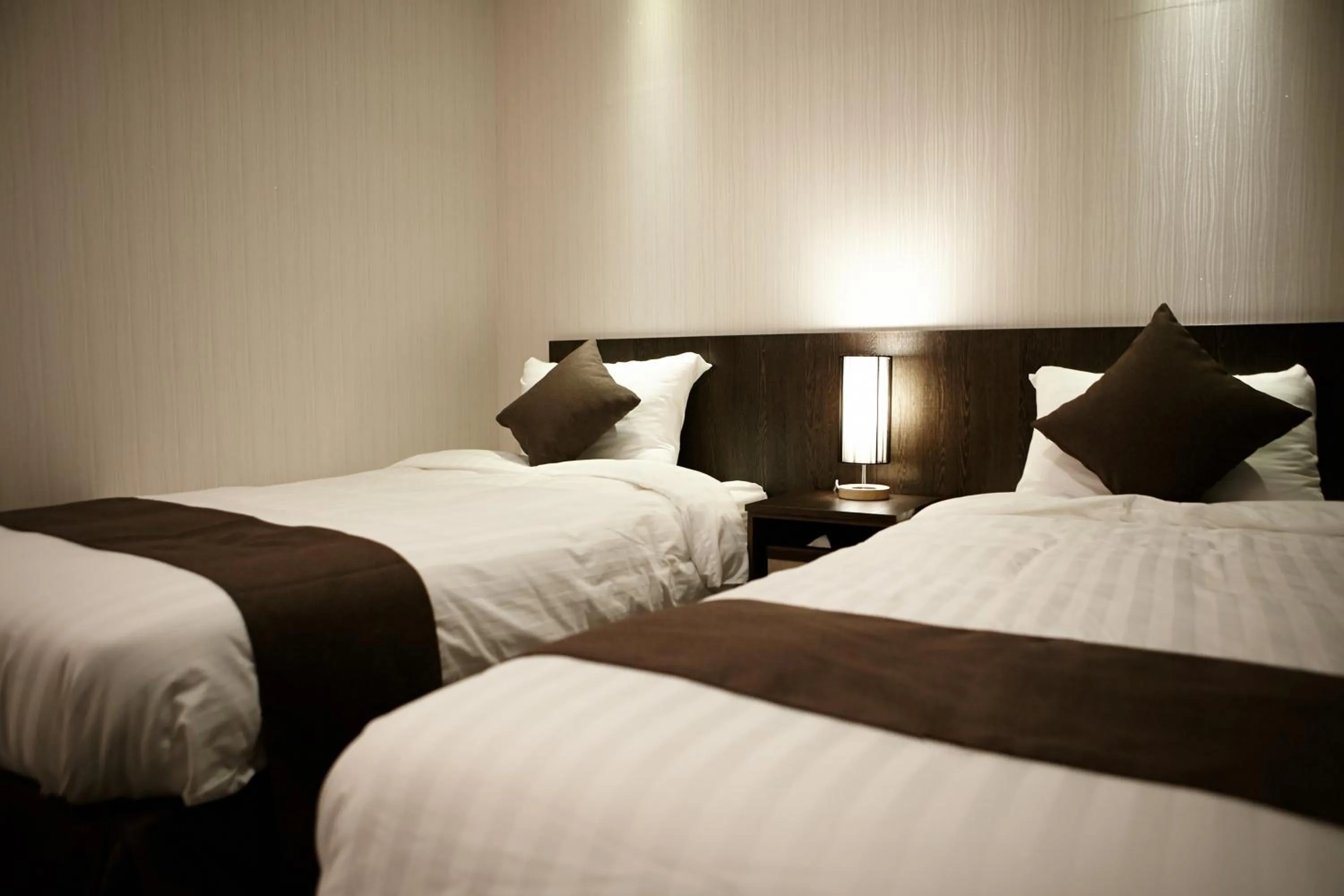 Bed in CS Premier Hotel