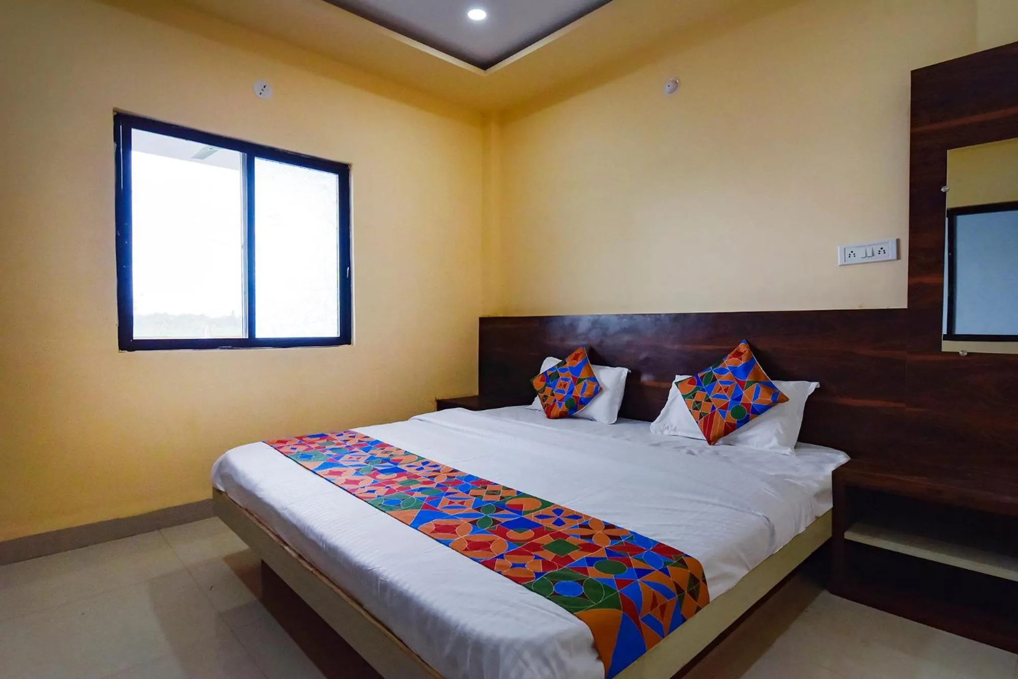 Bed in Via Shree Krishna Guest House