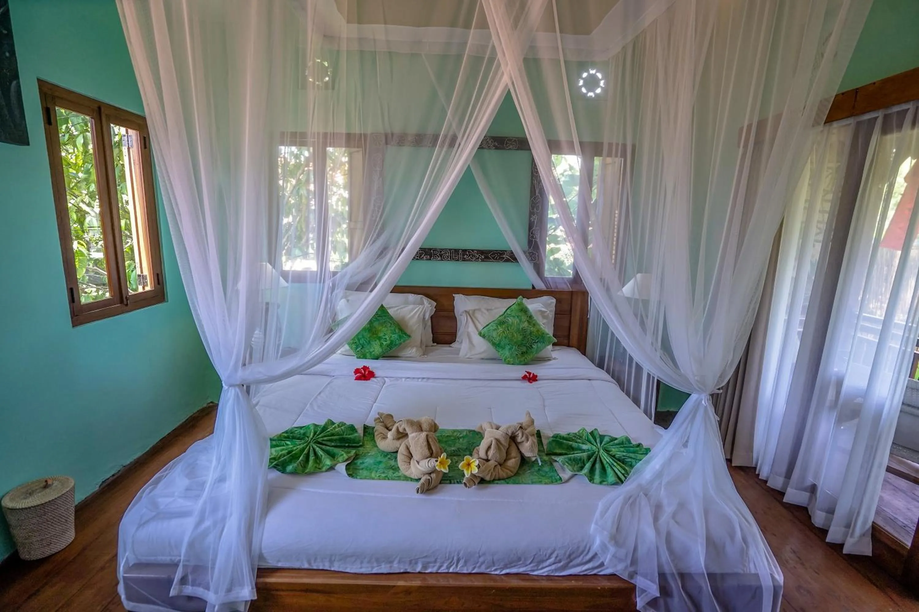 Bed in KTS Balinese Villas