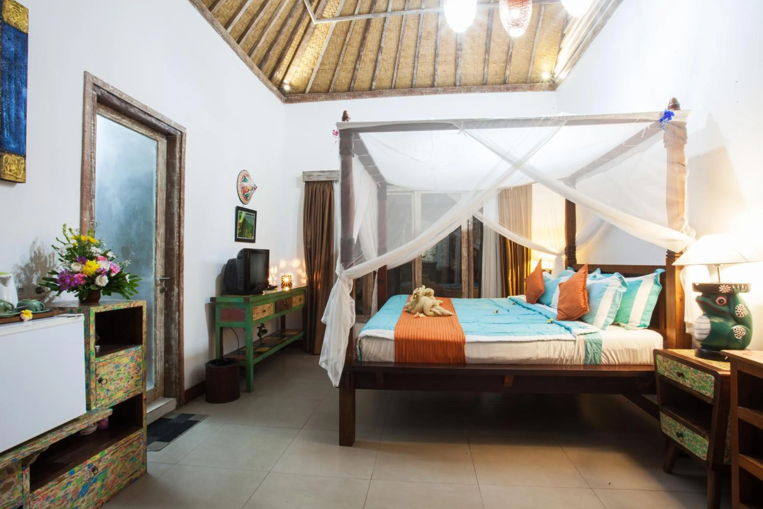 Bed in KTS Balinese Villas