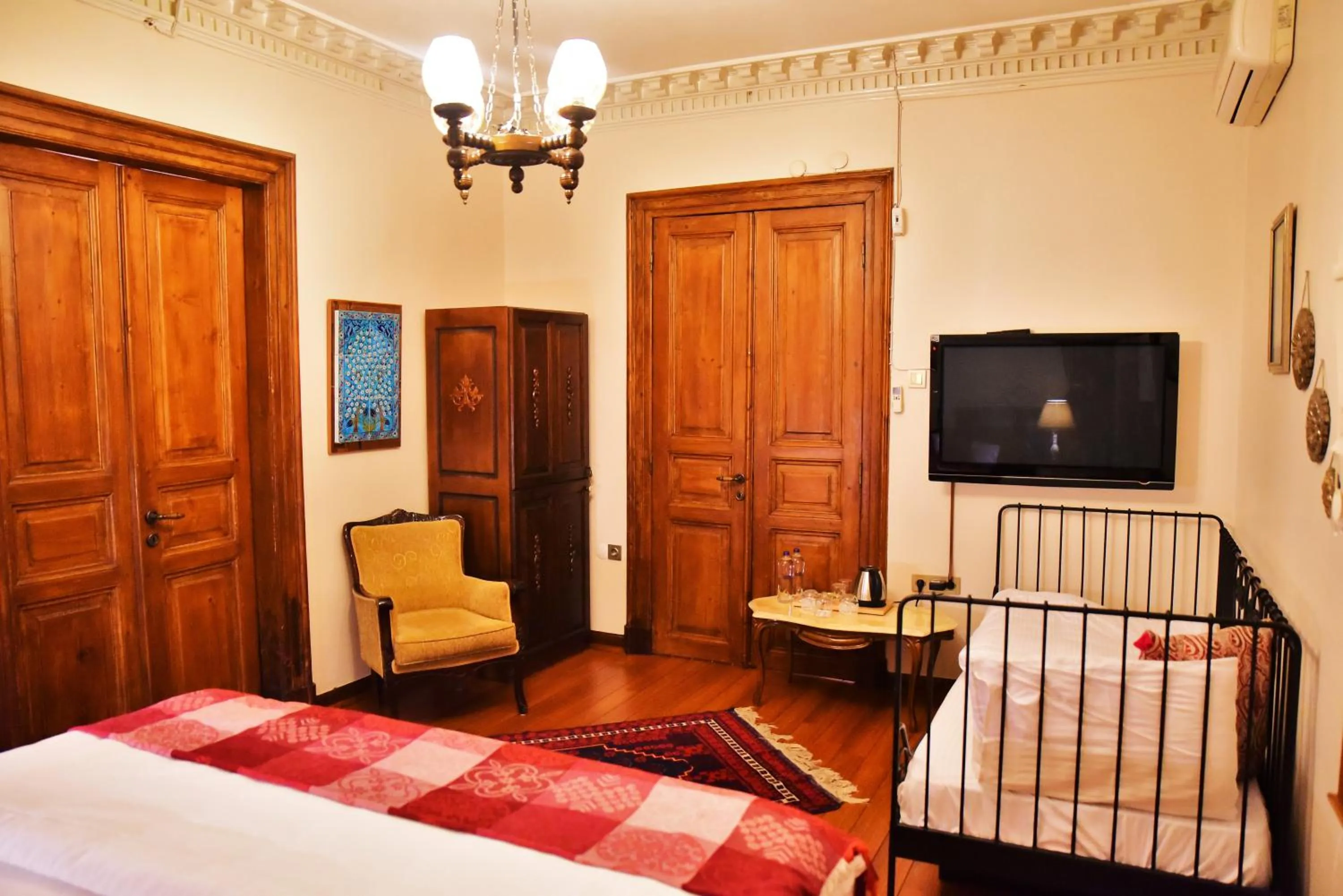Photo of the whole room, Bed in Ottoman Suites by Sera House