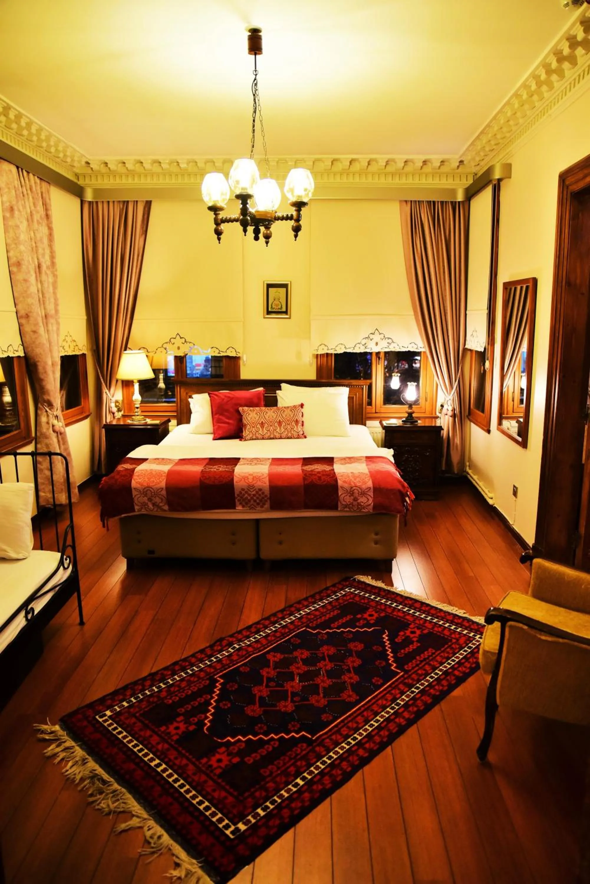 Photo of the whole room, Bed in Ottoman Suites by Sera House