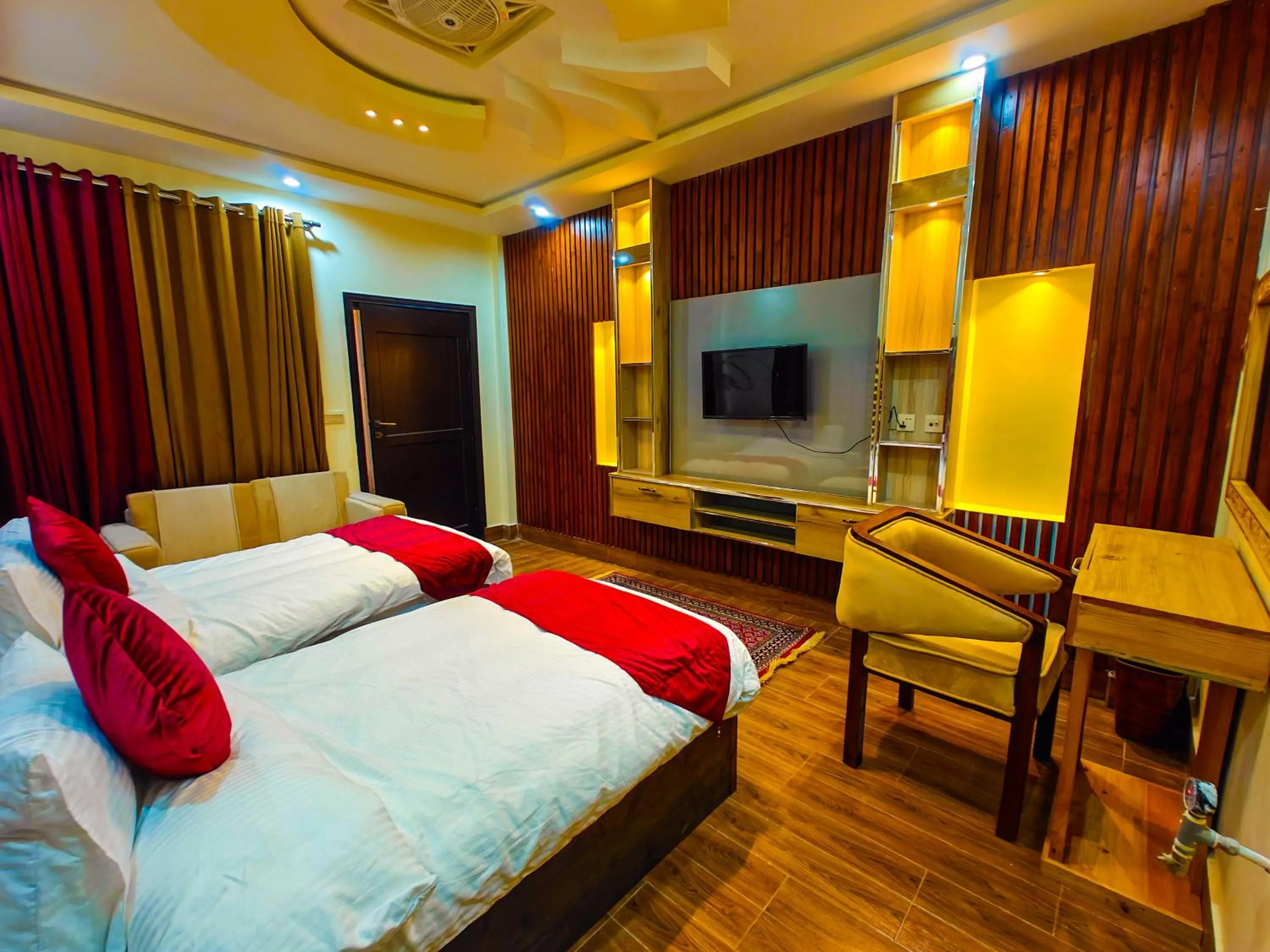 Bed in Kabirs Hotel Kalam