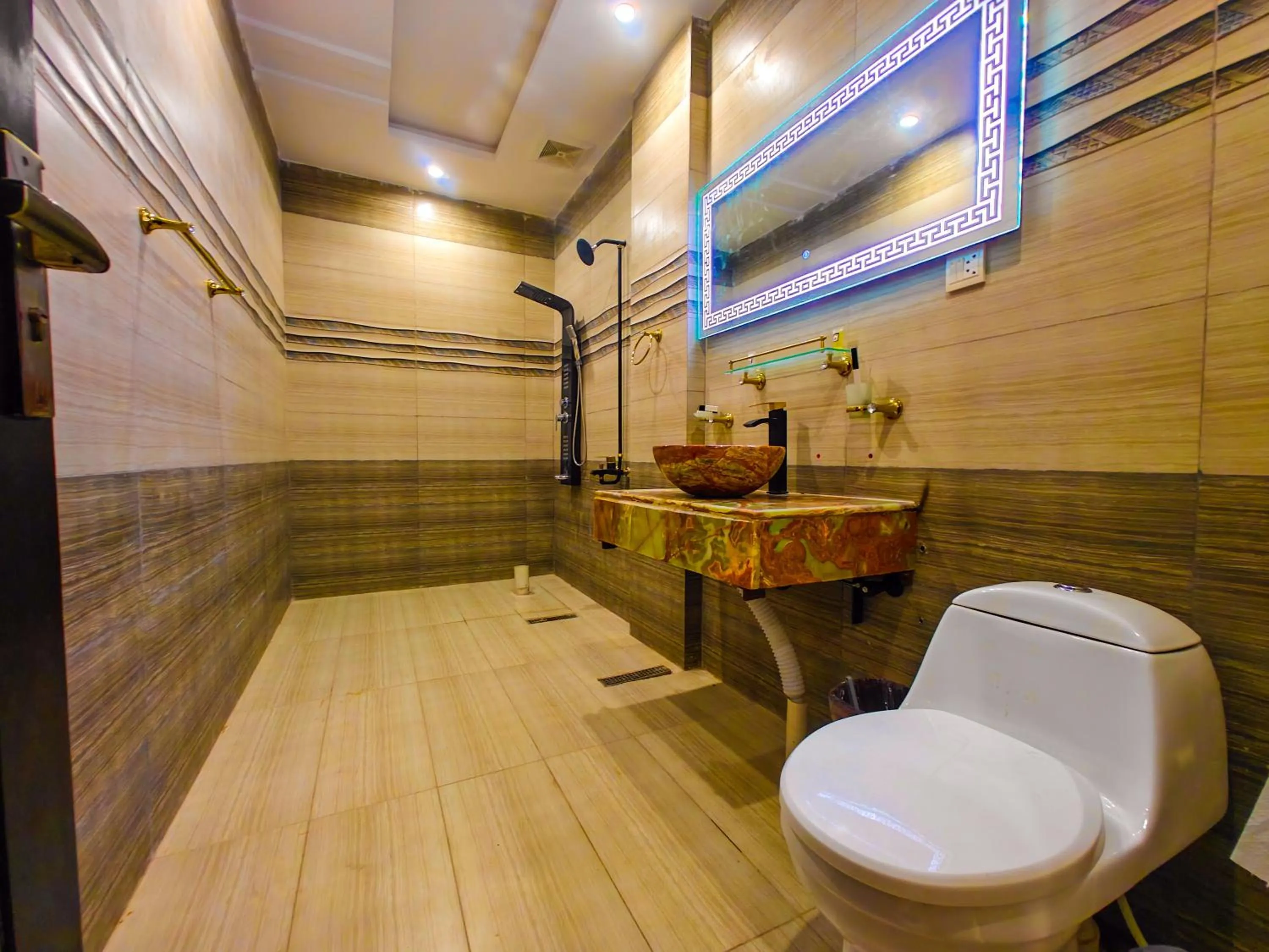 Bathroom in Kabirs Hotel Kalam