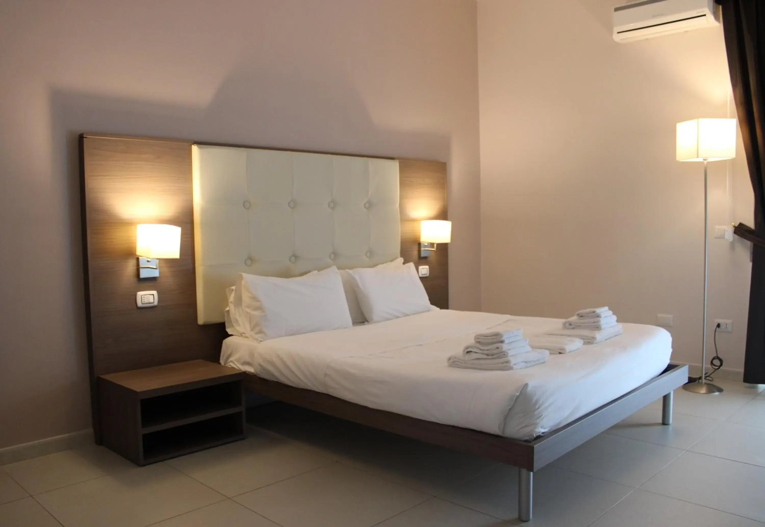 Family Room in Brain Rooms - Centro Città, Pulizia Giornaliera, Colazione Inclusa Family Room in Brain Rooms - Centro Città, Pulizia Giornaliera, Colazione Inclusa