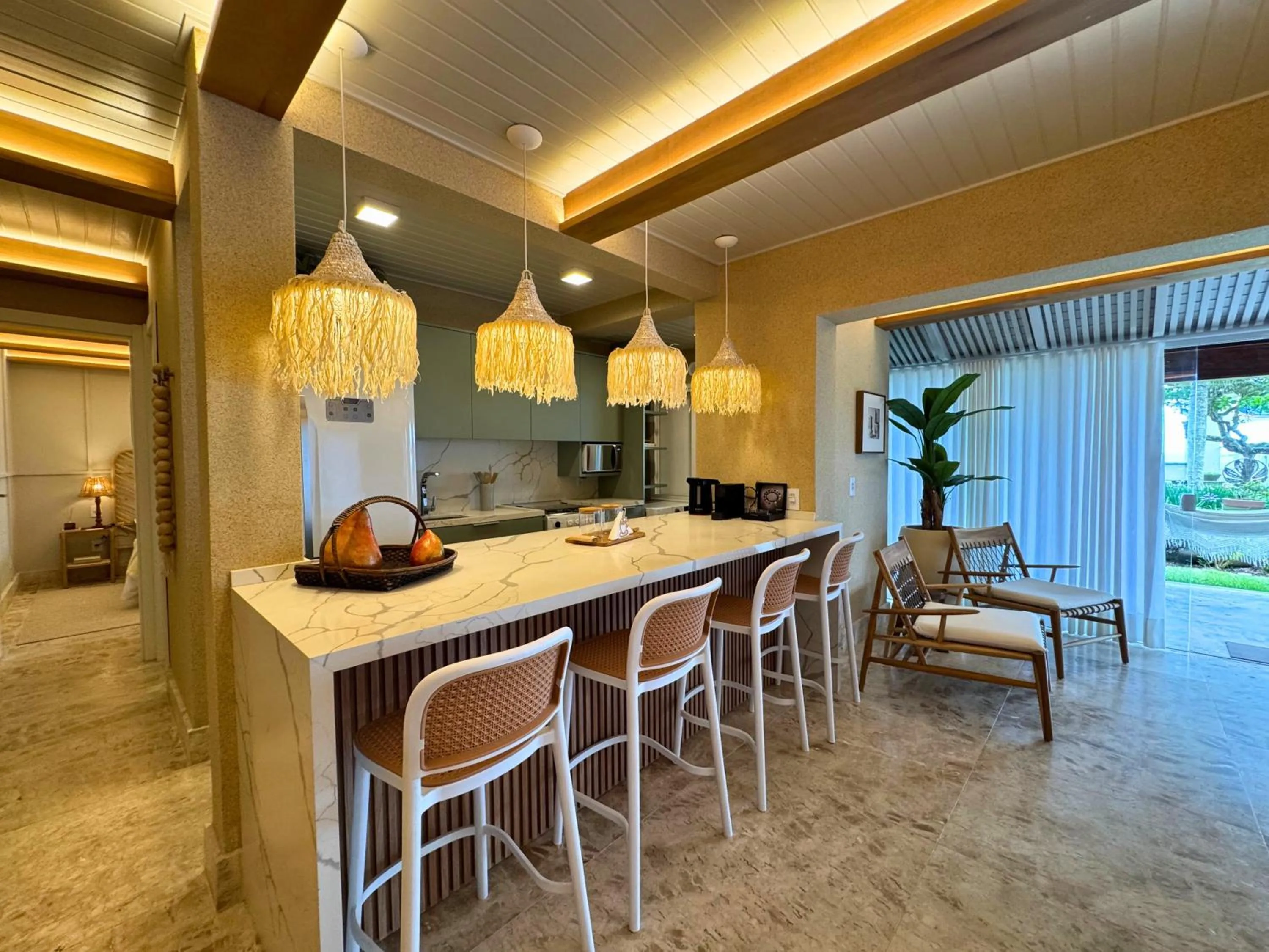 Kitchen or kitchenette in Villas Jurerê Residences