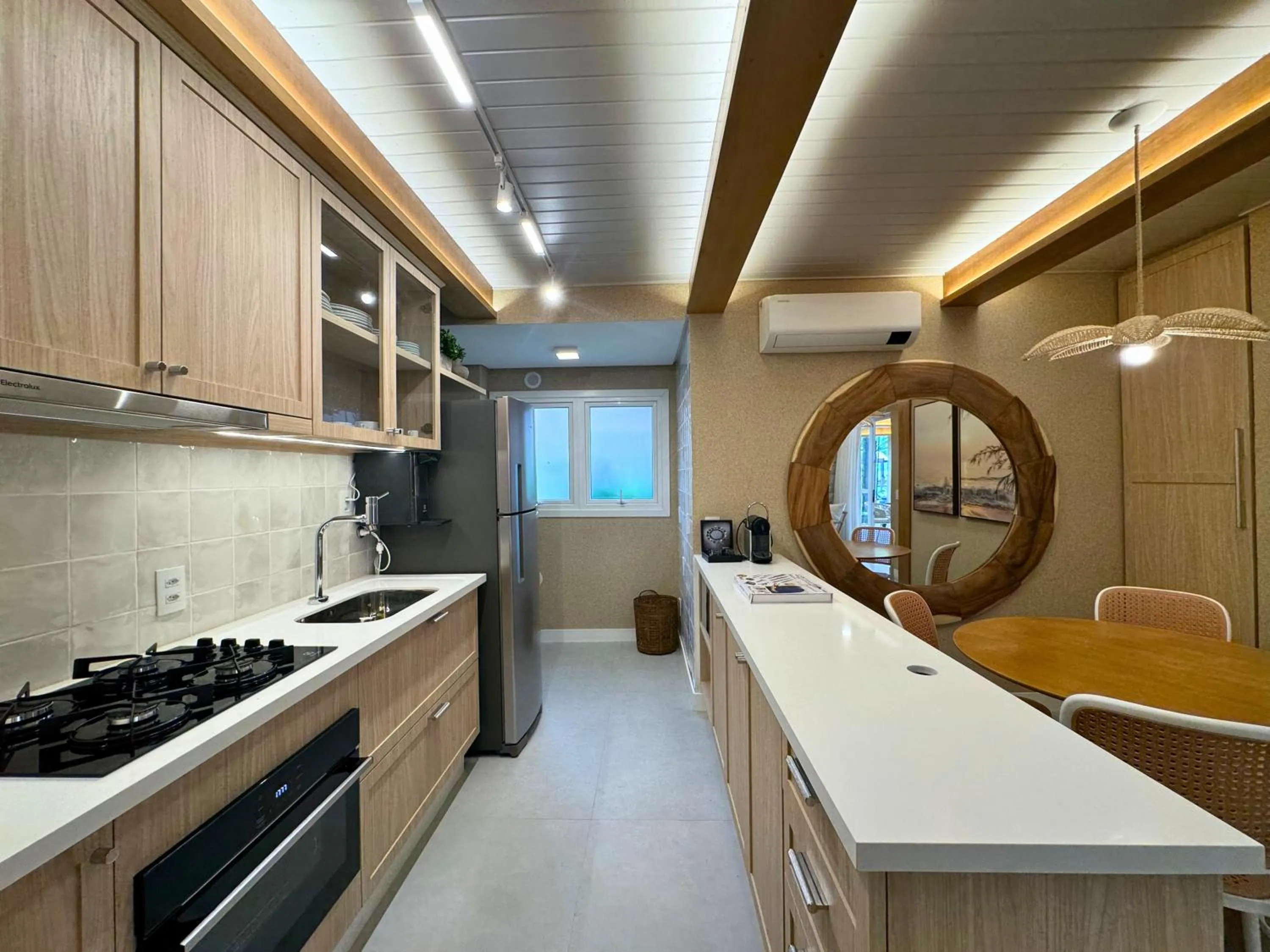 Kitchen or kitchenette in Villas Jurerê Residences