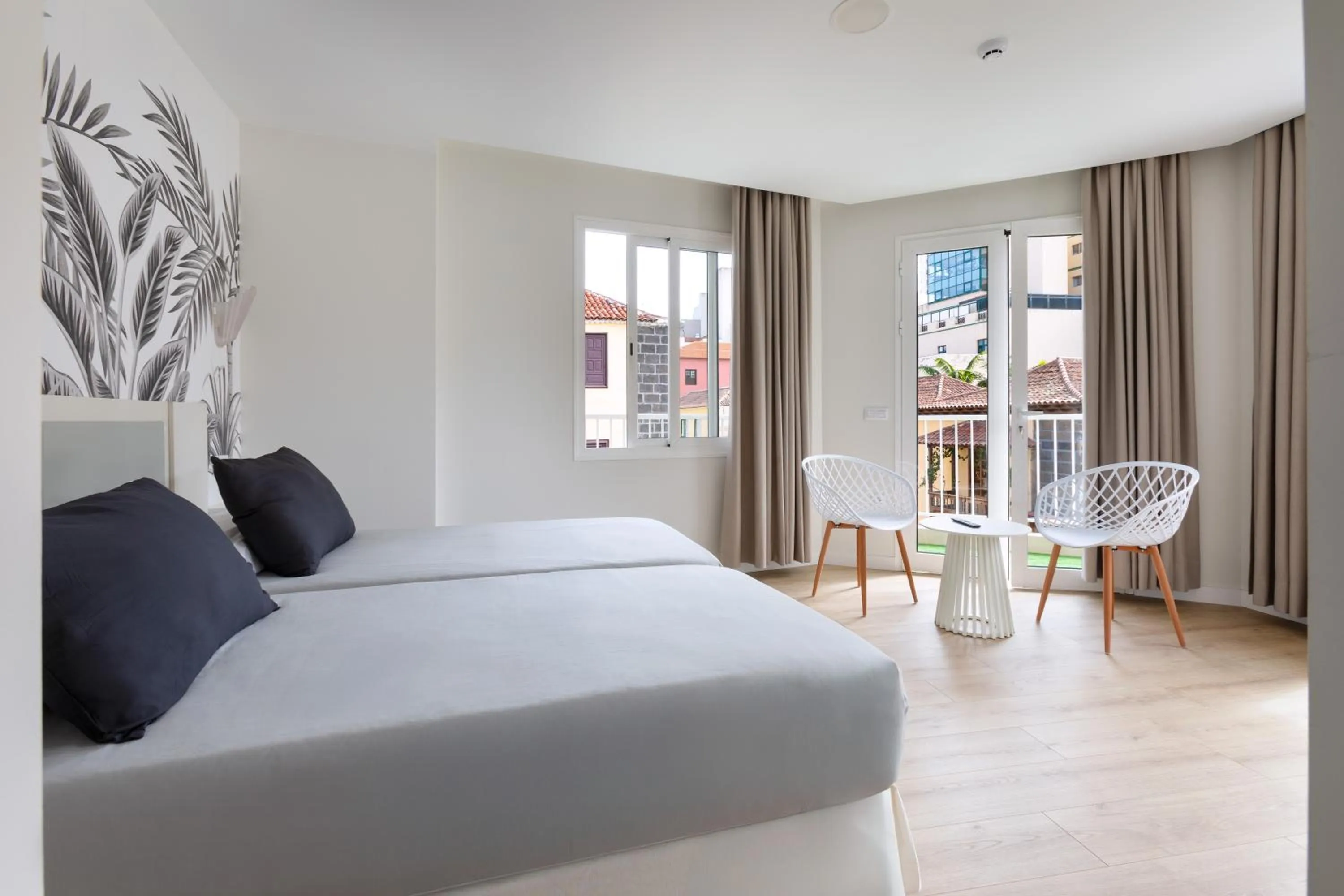 Photo of the whole room, Bed in Hotel Boutique HC Maga