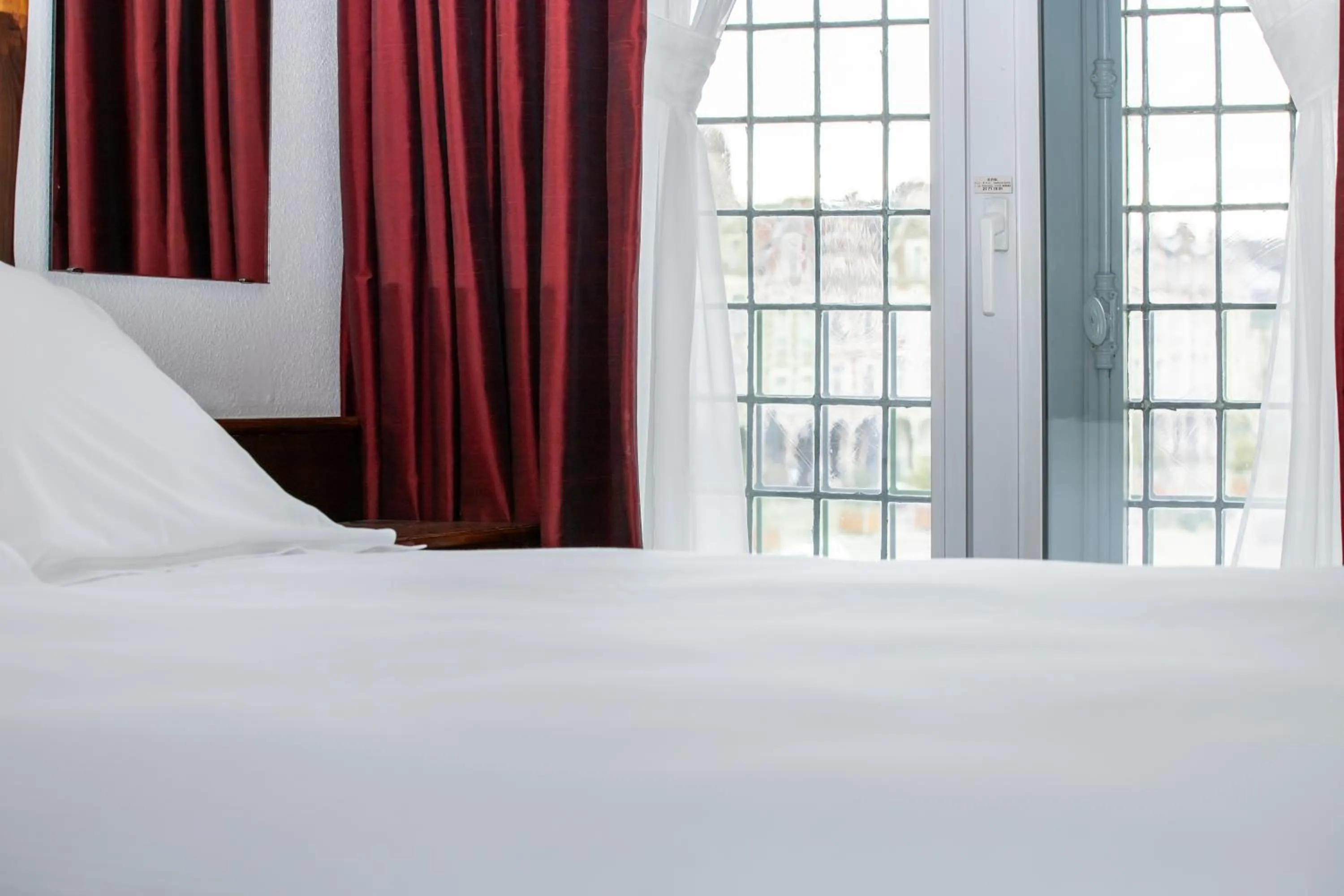 Bed in Hôtel Les Trois Luppars