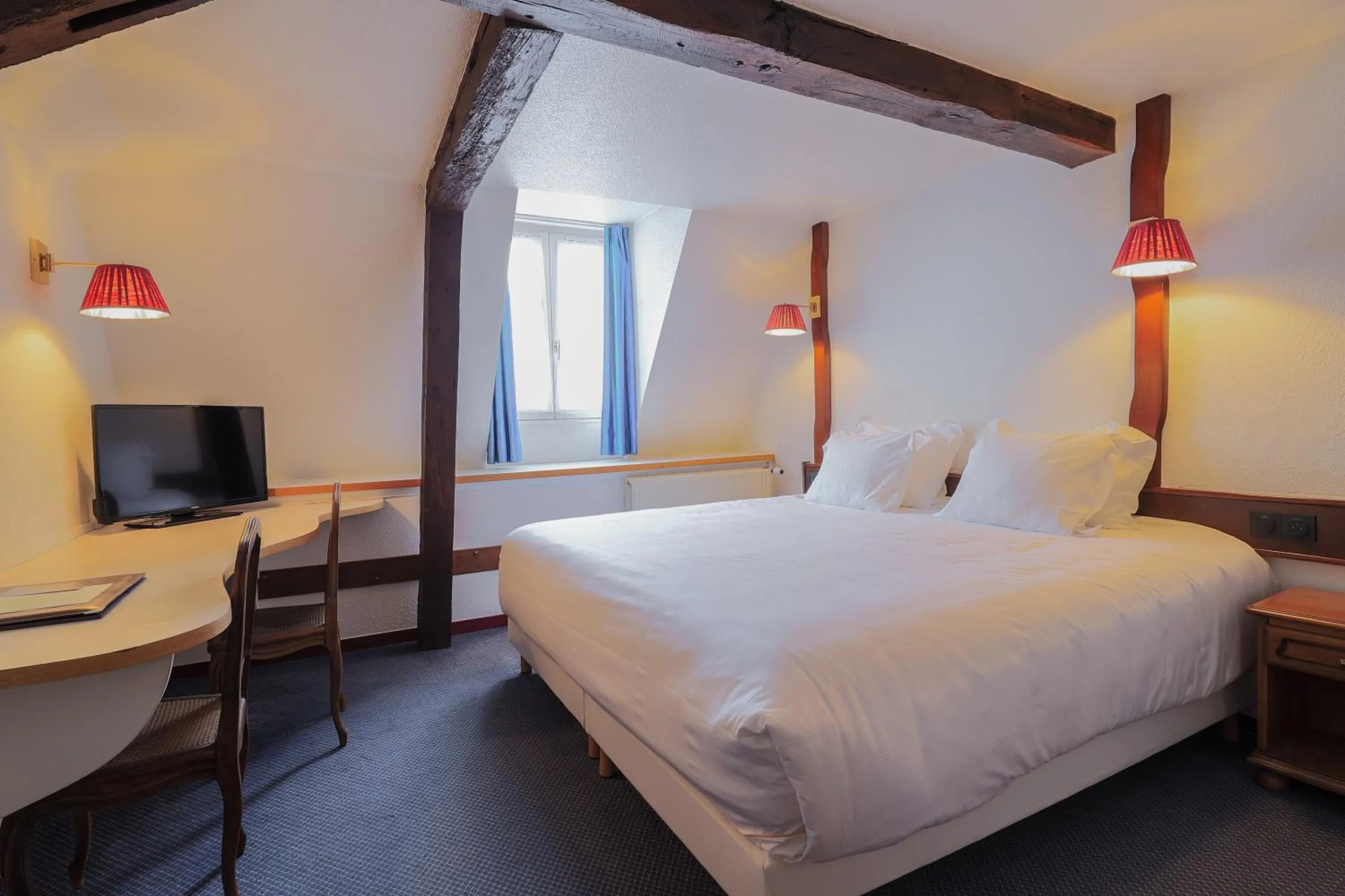 Bed in Hôtel Les Trois Luppars